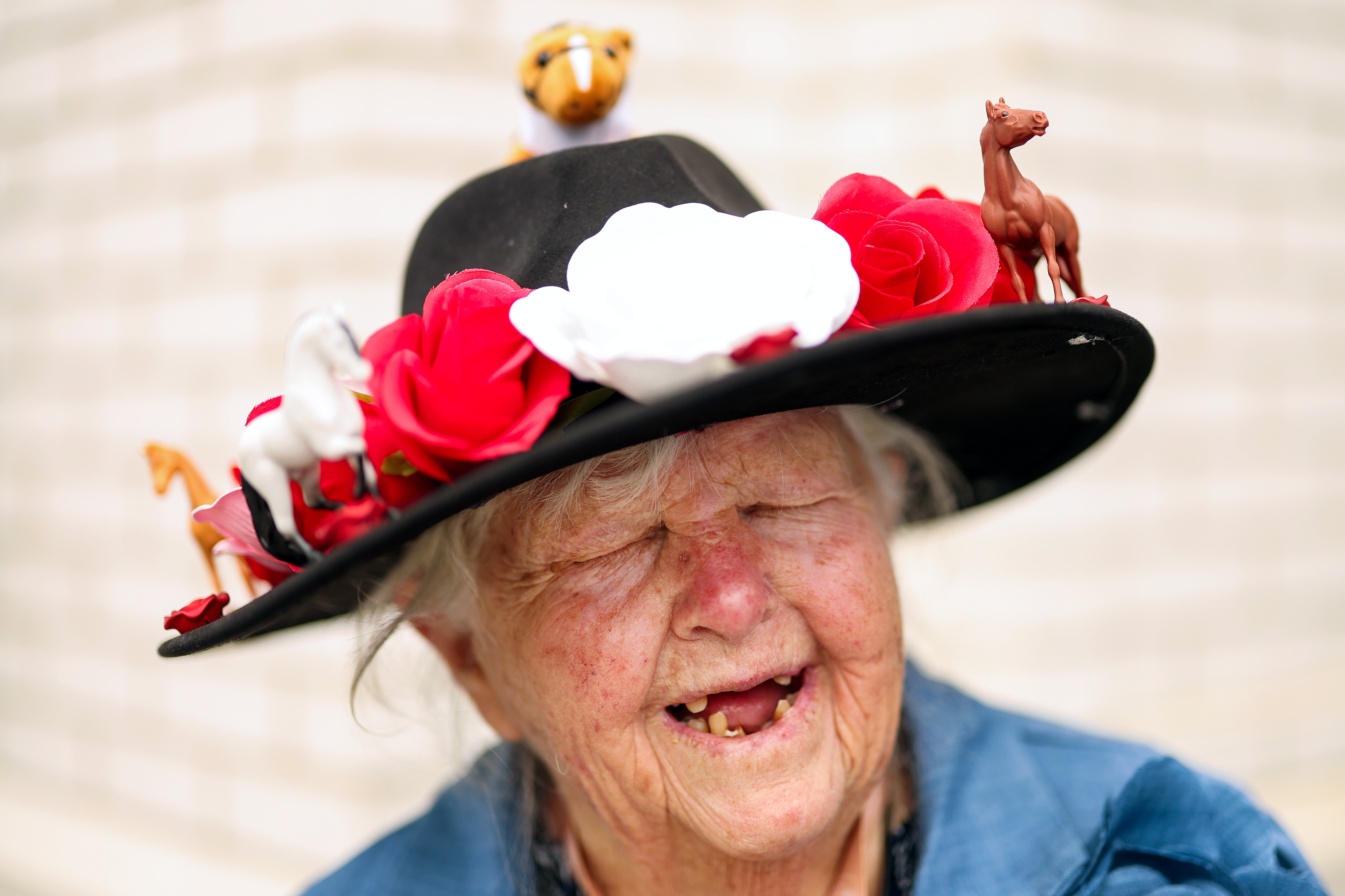 LOUISVILLE, KENTUCKY - MAY 02: A woman wears a hat decorated with toy horses ahead of the running of the 152th Kentucky Derby at Churchill Downs on May 02, 2026 in Louisville, Kentucky. (Photo by Steph Chambers/Getty Images)