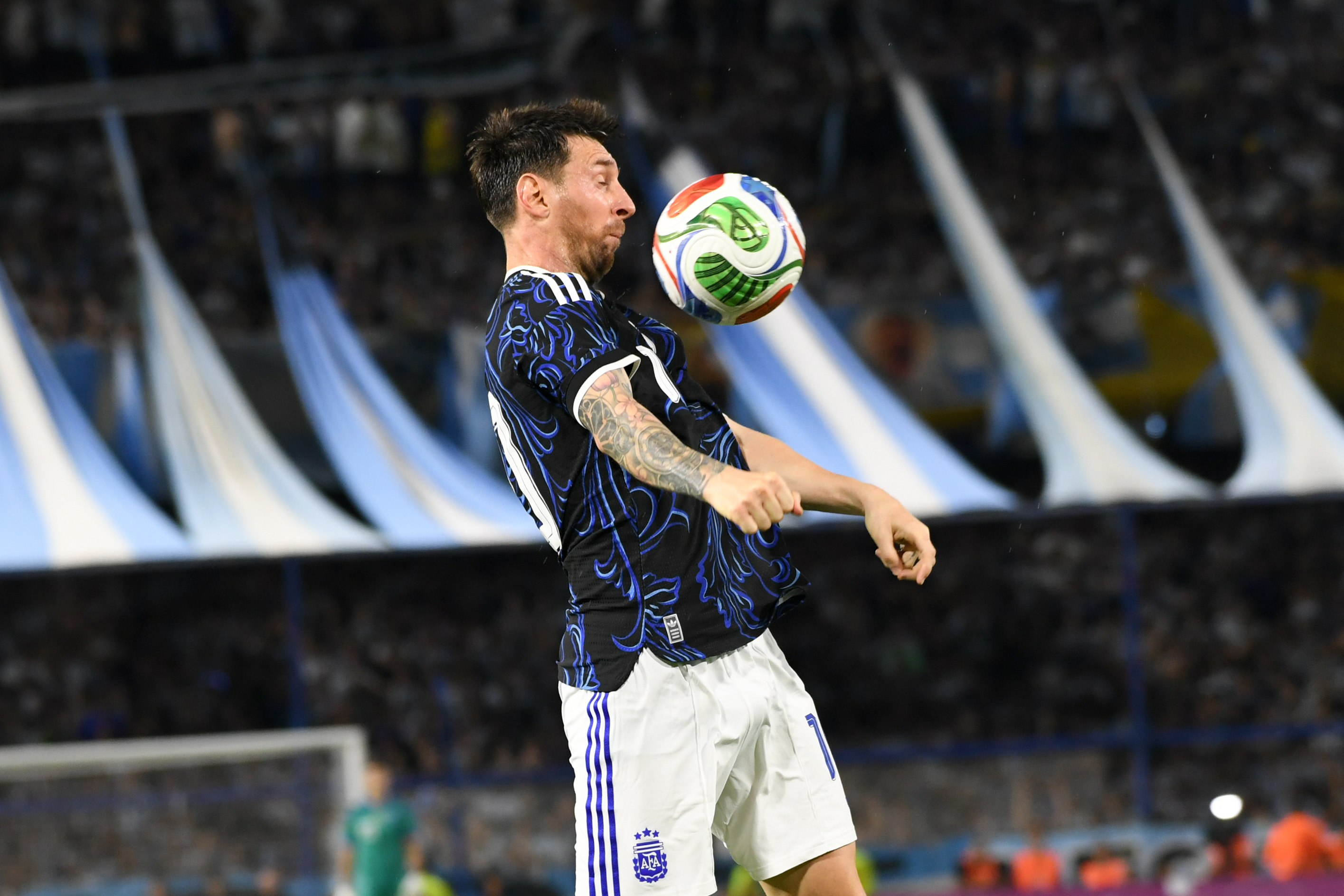 Lionel Messi controls the ball with his chest in the Zambia penalty area at La Bombonera stadium in Buenos Aires, Argentina, on March 31, 2026, during a match against Zambia ahead of the FIFA 2026 World Cup. (Photo by Pablo Elias/NurPhoto via Getty Images)