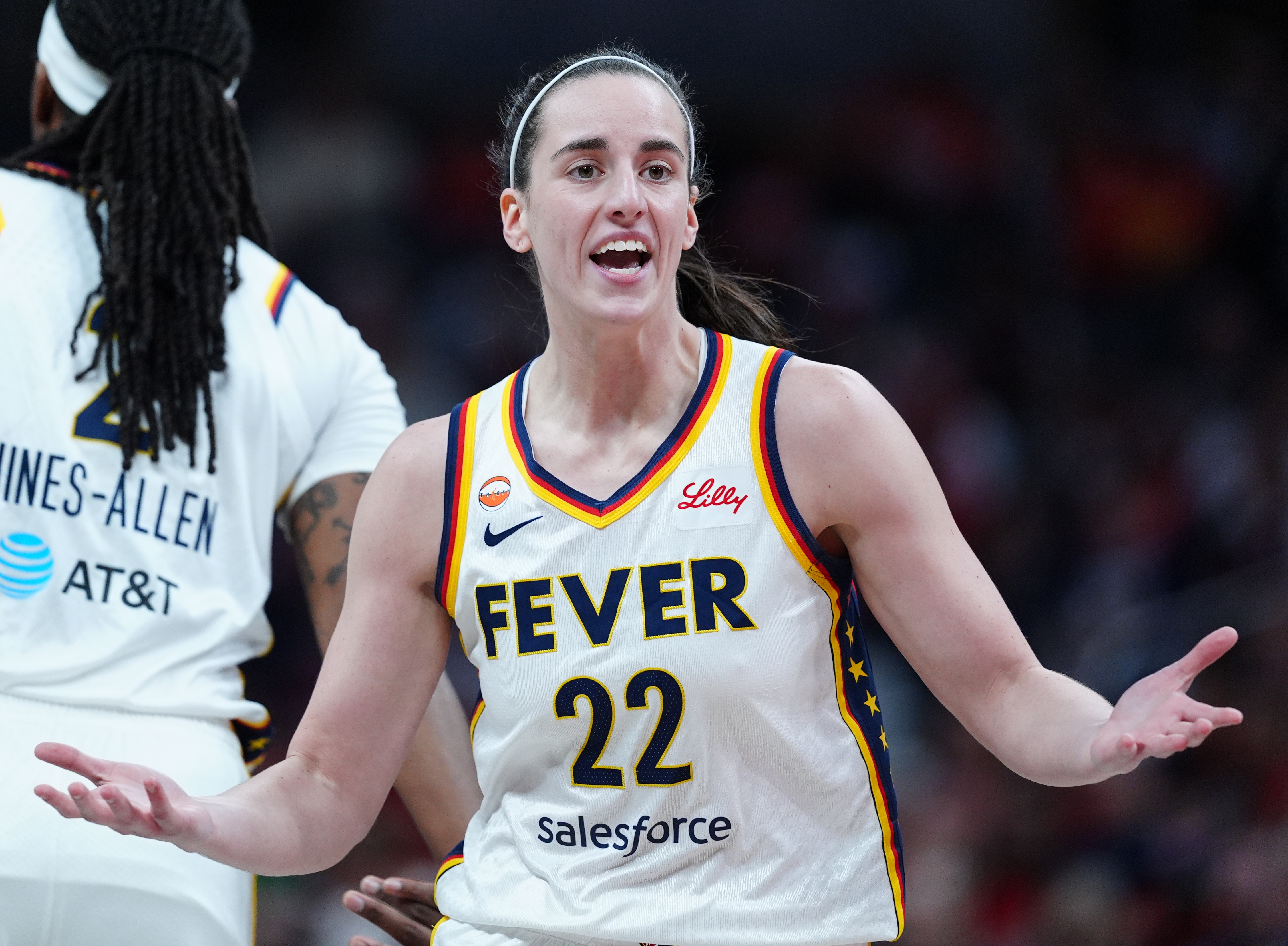 INDIANAPOLIS, IN - APRIL 30: Indiana Fever guard Caitlin Clark (22) questions being called for a delay of game against the Dallas Wings during a preseason game on April 30 at Gainbridge Fieldhouse in Indianapolis, Indiana. (Photo by Brian Spurlock/Icon Sportswire via Getty Images)