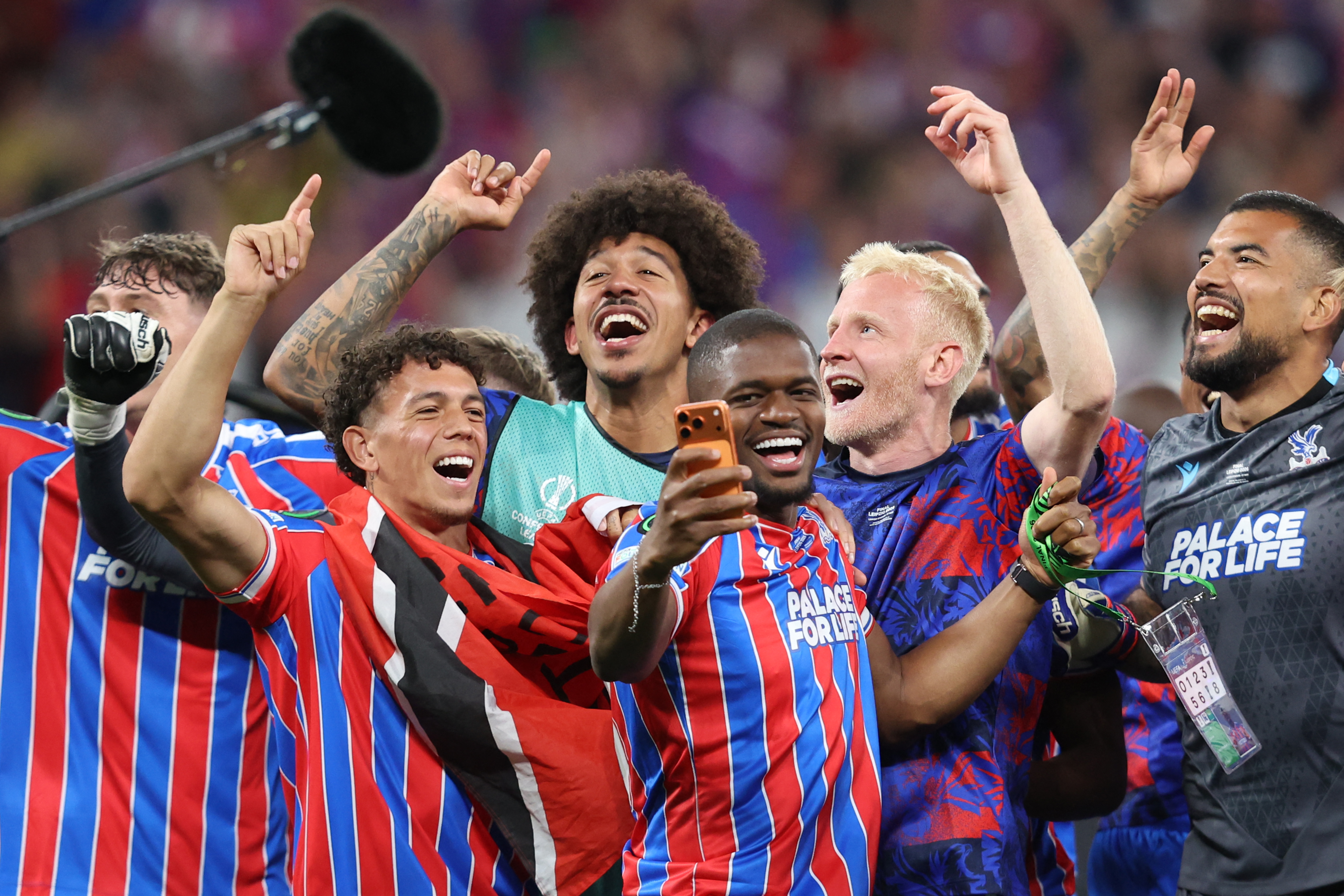 Players of Crystal Palace FC team celebrate after winning the UEFA Conference League final football match between Crystal Palace FC and Rayo Vallecano de Madrid in Leipzig, eastern Germany, on May 27, 2026. (Photo by Ronny HARTMANN / AFP via Getty Images)