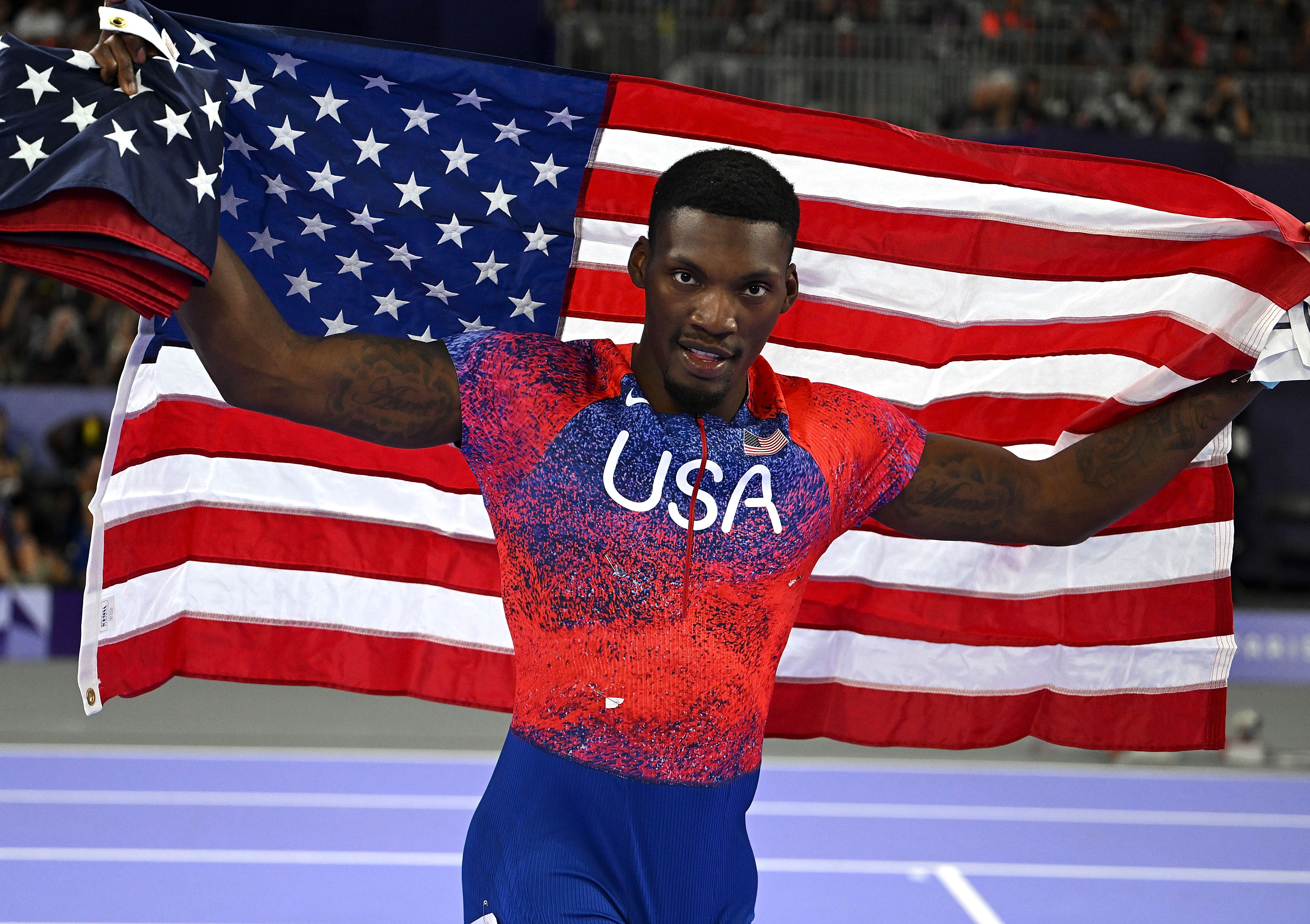 Fred Kerley of the United States celebrates after the men's 100m final of Athletics at the Paris 2024 Olympic Games in Paris, France, Aug. 4, 2024. (Photo by Song Yanhua/Xinhua via Getty Images)