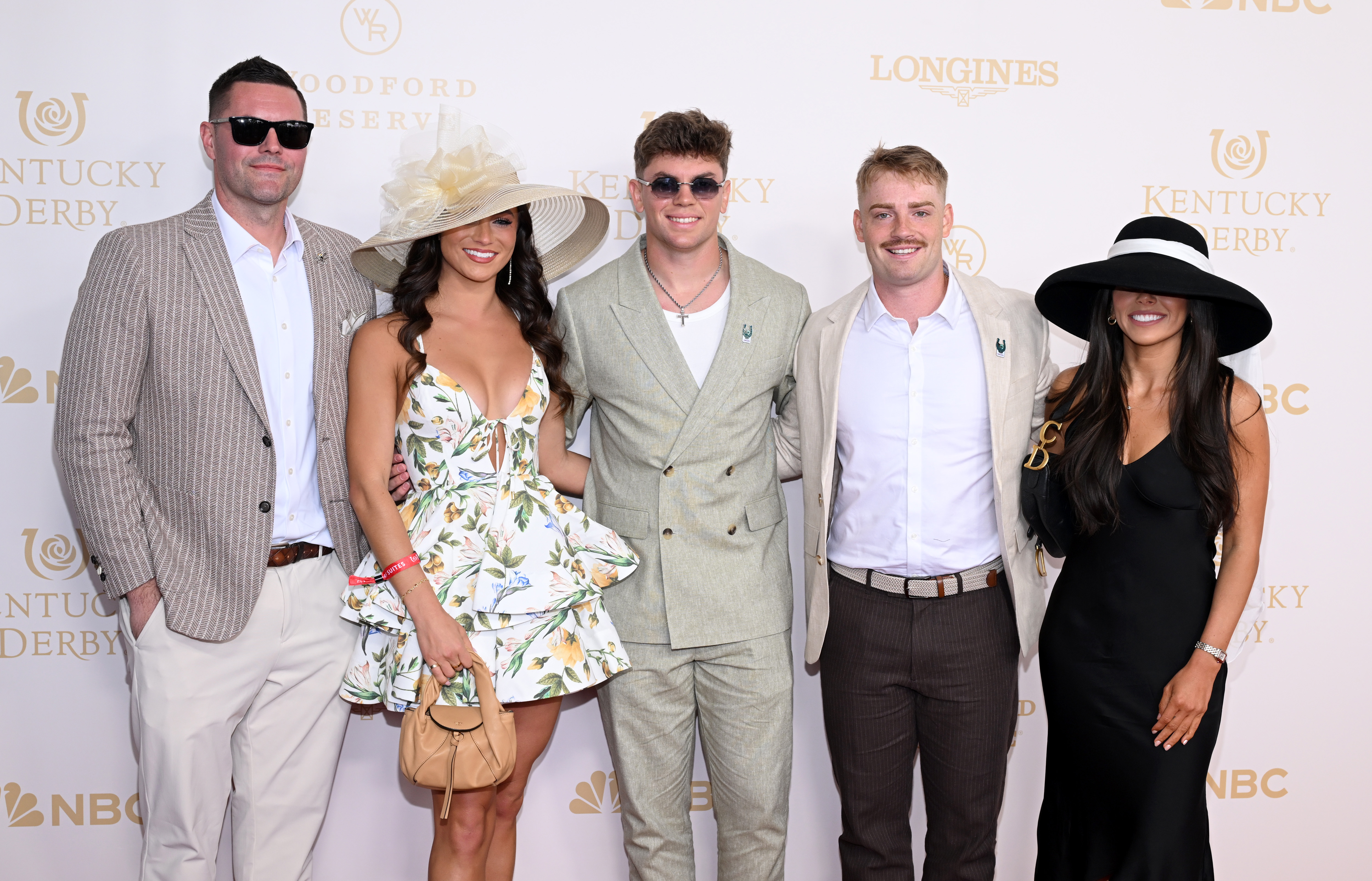 LOUISVILLE, KENTUCKY - MAY 02: Cooper DeJean (C) attends the Kentucky Derby 152 at Churchill Downs on May 02, 2026 in Louisville, Kentucky. (Photo by Daniel Boczarski/Getty Images for Churchill Downs)