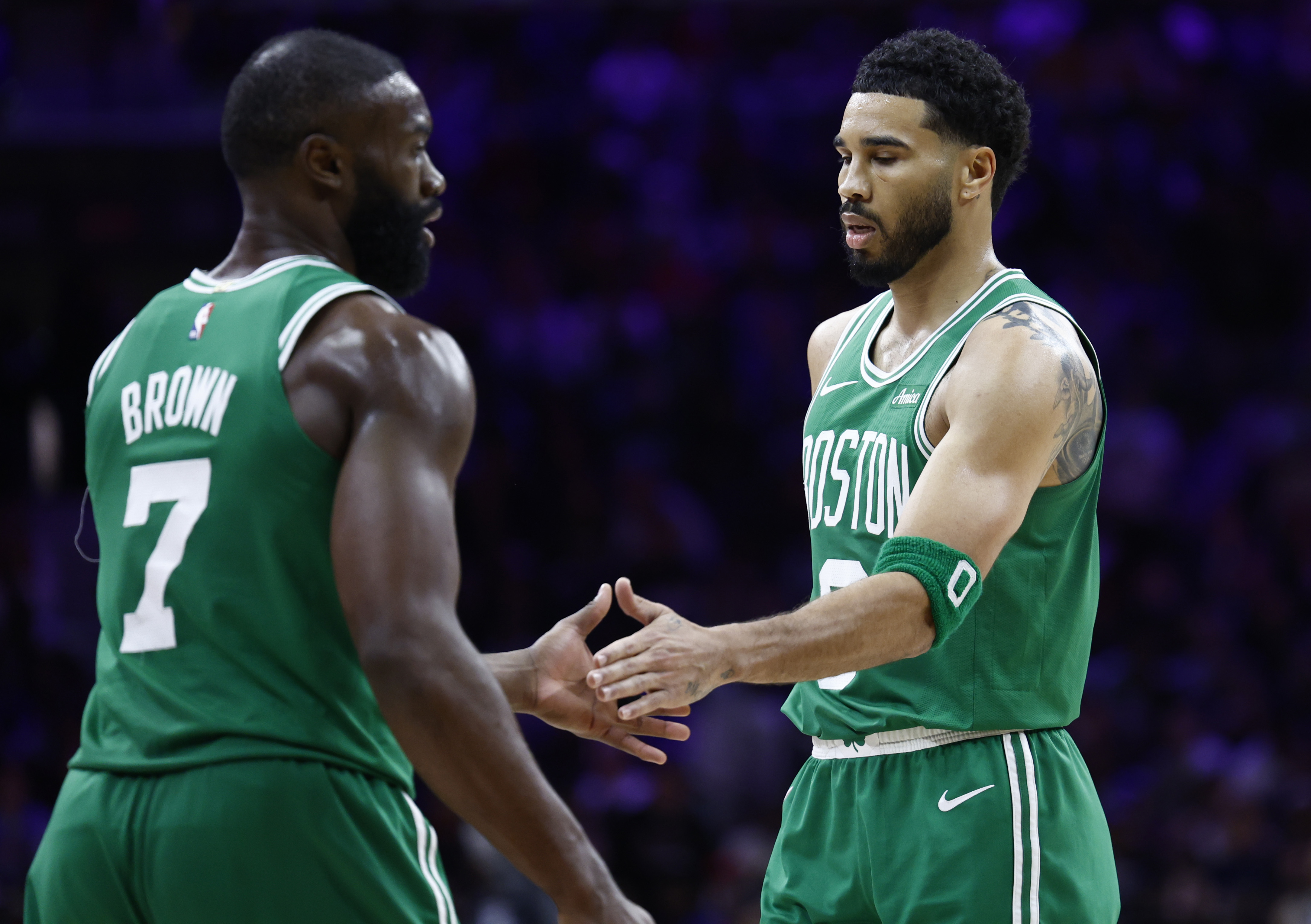 Philadelphia, PA - April 26: Boston Celtics forward Jayson Tatum and guard Jaylen Brown high five in the third quarter. The Boston Celtics and Philadelphia 76ers played in the first round of the NBA Playoffs at Xfinity Mobile Arena on April 26, 2026. (Photo by Danielle Parhizkaran/The Boston Globe via Getty Images)