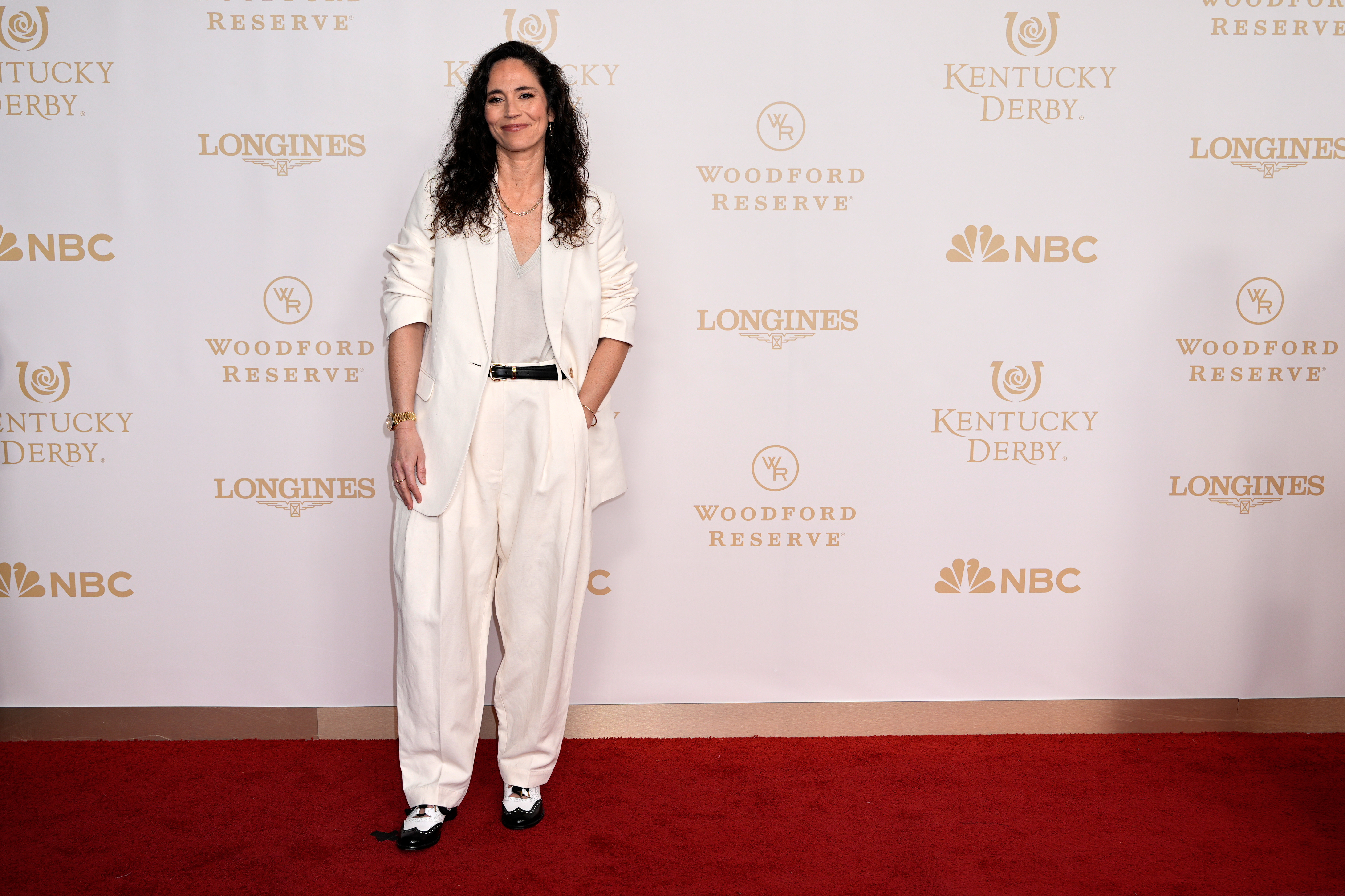 Former WNBA player Sue Bird walks the red carpet before the 152nd running of the Kentucky Derby horse race at Churchill Downs, Saturday, May 2, 2026, in Louisville, Ky. (AP Photo/George Walker IV)