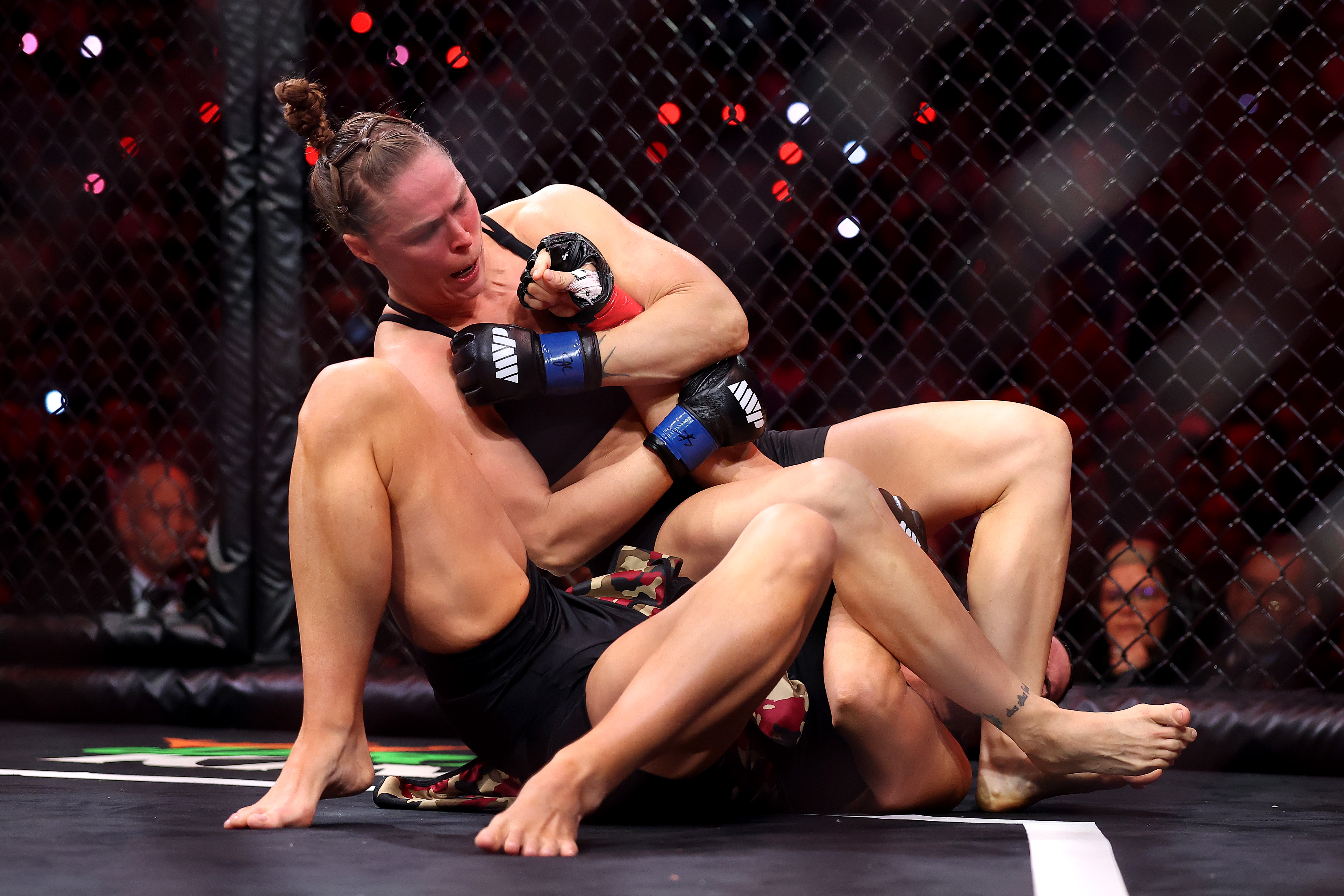 INGLEWOOD, CALIFORNIA - MAY 16: Ronda Rousey forces Gina Carano into an armbar submission in their featherweight bout during the main card of Netflix's Ronda Rousey vs. Gina Carano at Intuit Dome on May 16, 2026 in Inglewood, California. (Photo by Sarah Stier/Getty Images for Netflix)