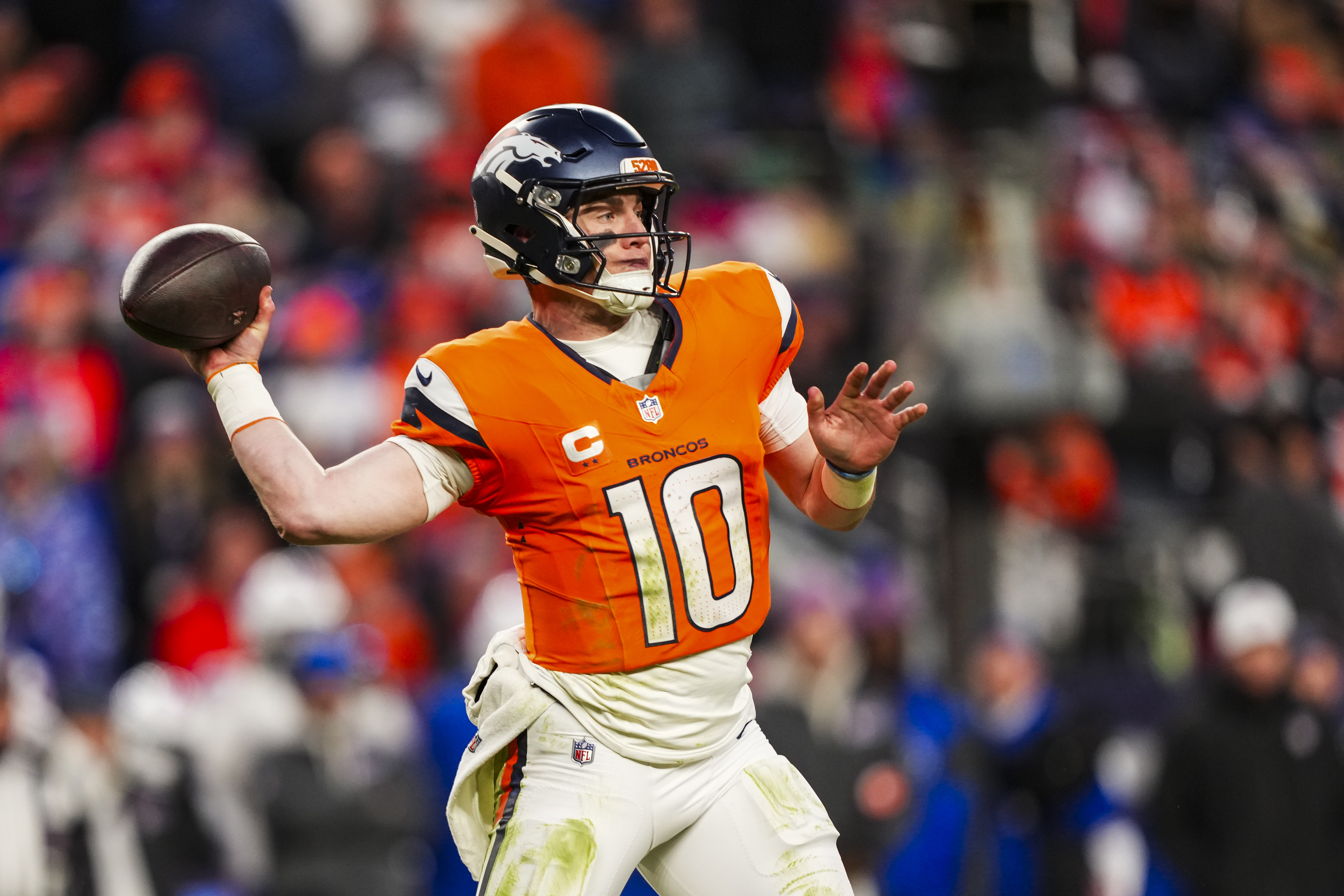 Bo Nix is returning from an ankle injury he suffered in the playoffs last season. (Photo by Perry Knotts/Getty Images)
