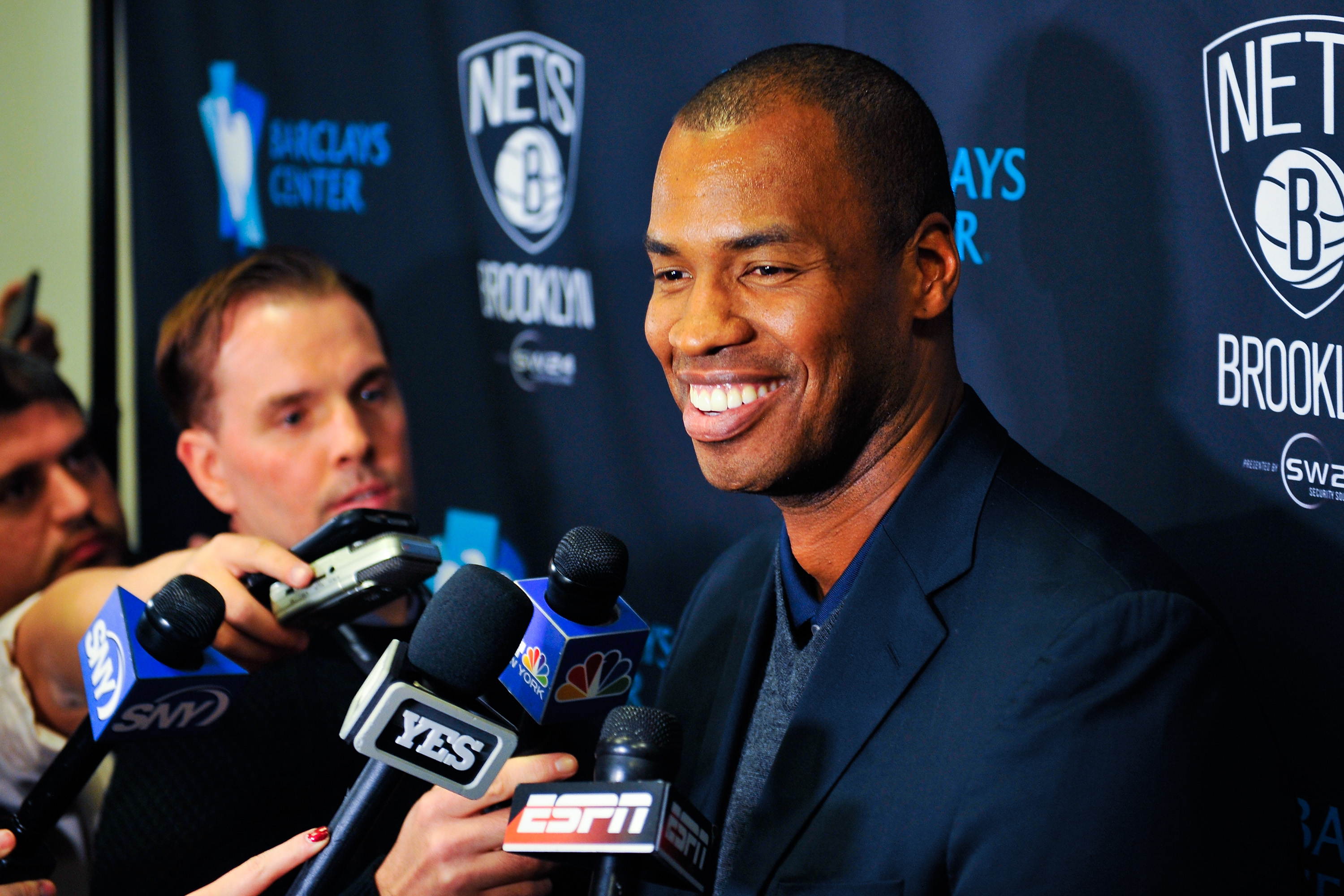 NEW YORK, NY - NOVEMBER 19:  Jason Collins speaks with the media before a game between the Brooklyn Nets and Milwaukee Bucks at the Barclays Center on November 19, 2014 in the Brooklyn borough of New York City. NOTE TO USER: User expressly acknowledges and agrees that, by downloading and/or using this photograph, user is consenting to the terms and conditions of the Getty Images License Agreement.  (Photo by Alex Goodlett/Getty Images)