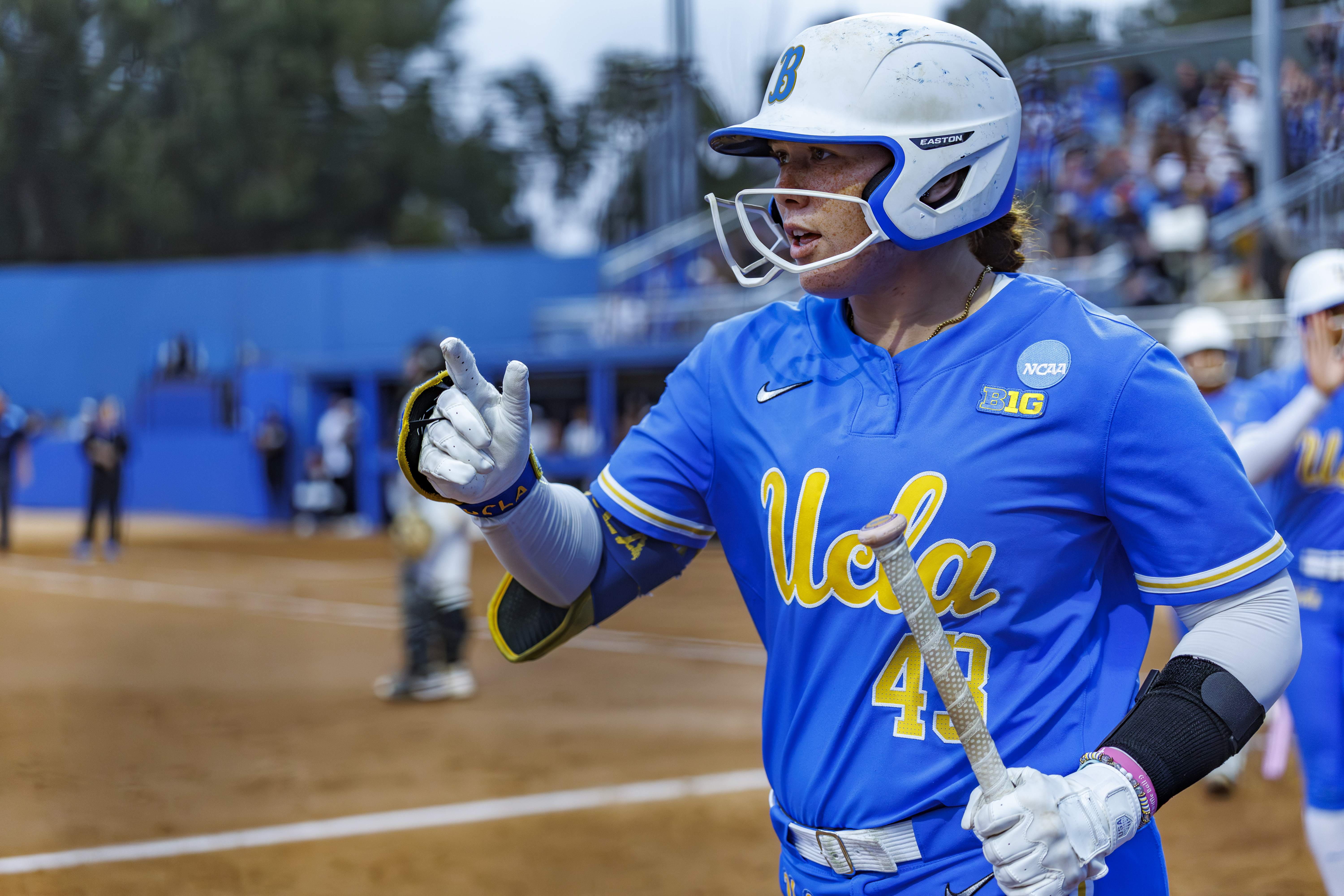 WESTWOOD, CA - MAY 23, 2026: UCLA Bruins Megan Grant (43) walks back to the dugout after hitting an RBI sacrifice fly to tie the game in the third inning against the UCF Knights in Game Two of the NCAA Softball Los Angeles Super Regional at Easton Stadium on May 23, 2026 in Westwood, CA.  (Gina Ferazzi / Los Angeles Times via Getty Images)