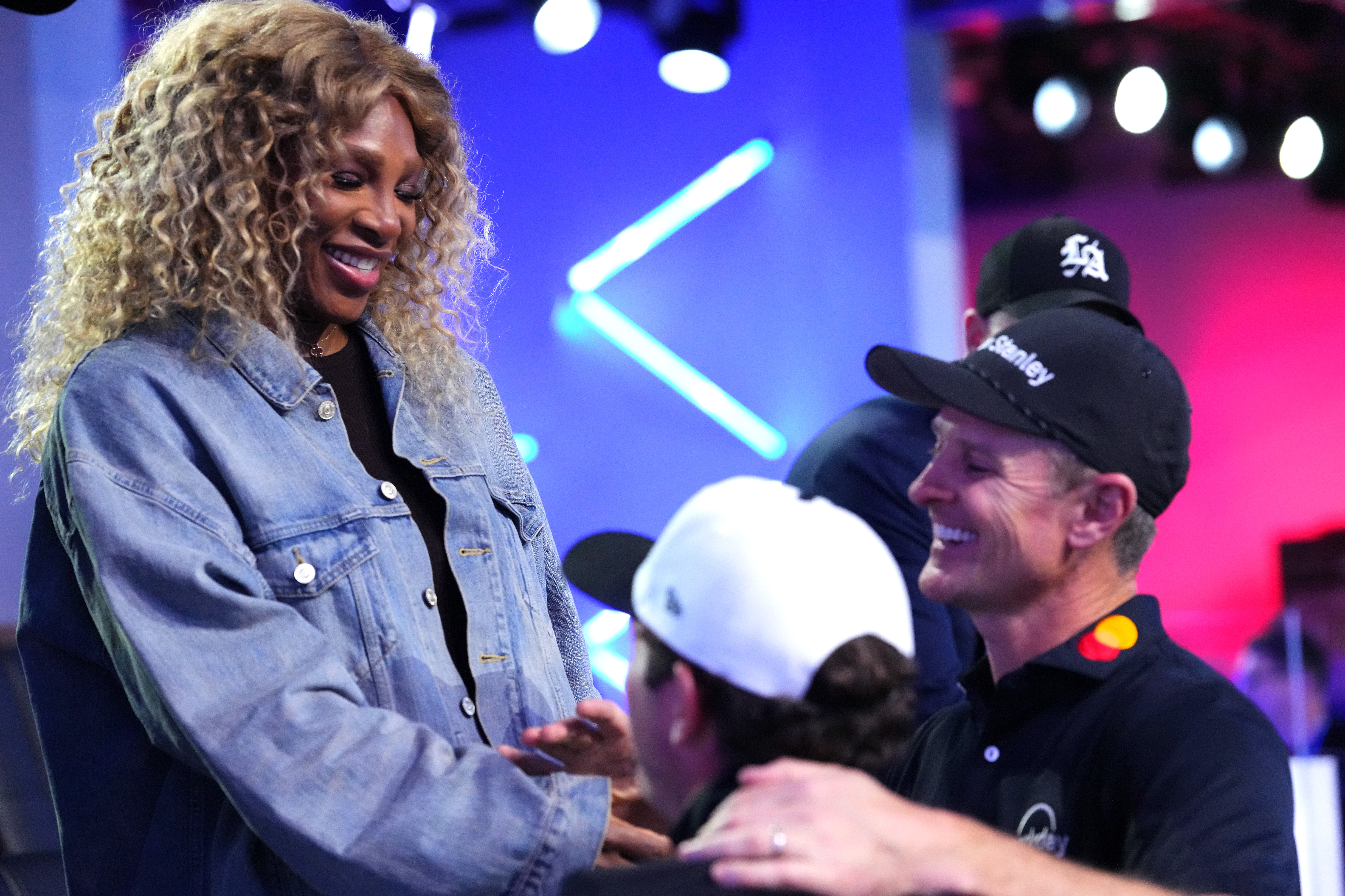 PALM BEACH GARDENS, FLORIDA - FEBRUARY 23: Los Angeles Golf Club owner Serena Williams shakes hands with Justin Rose of the Los Angeles Golf Club after the match against the Atlanta Drive GC at SoFi Center on February 23, 2026 in Palm Beach Gardens, Florida. (Photo by Rich Storry/TGL/TGL Golf via Getty Images)