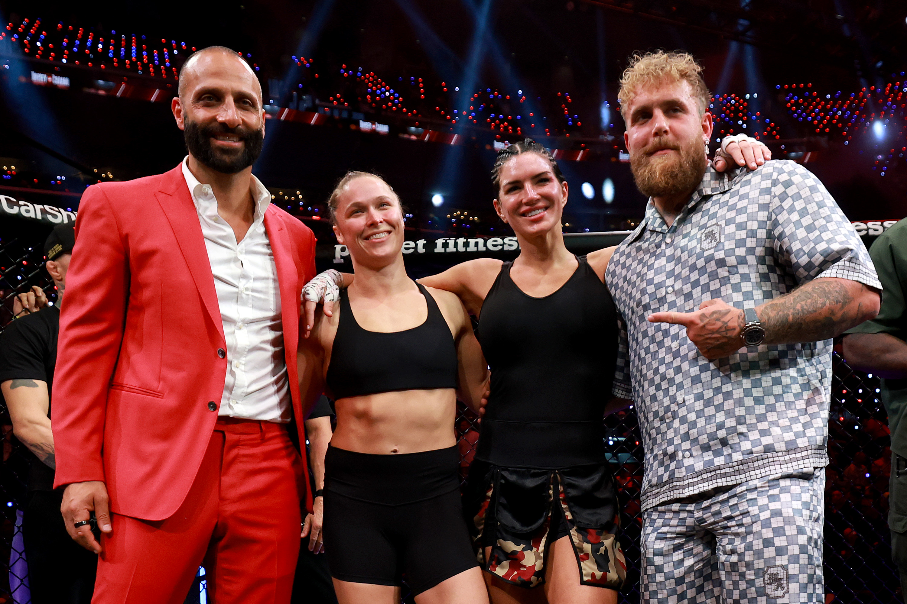 INGLEWOOD, CALIFORNIA - MAY 16: Nakisa Bidarian, Ronda Rousey, Gina Carano, and Jake Paul pose for a photo after the featherweight bout during the main card of Netflix's Ronda Rousey vs. Gina Carano at Intuit Dome on May 16, 2026 in Inglewood, California. (Photo by Sarah Stier/Getty Images for Netflix)