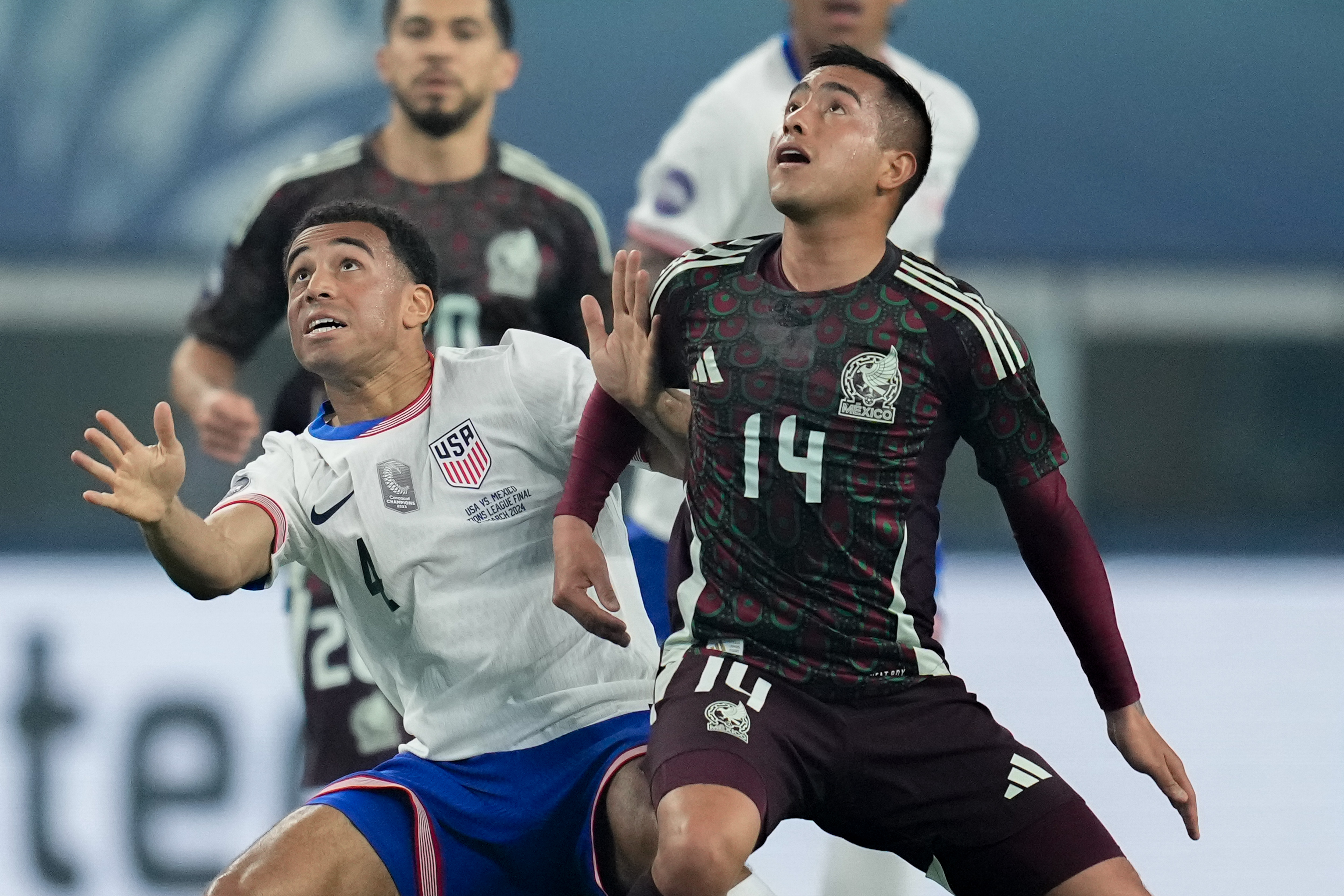 ARLINGTON, TX - MARCH 24: Tyler Adams #4 of the United States battling with Erick Sanchez #14 of Mexico during the CONCACAF Nations League Final between Mexico and USMNT at AT&T Stadium on March 24, 2024 in Arlington, Texas. (Photo by Robin Alam/ISI Photos/Getty Images)