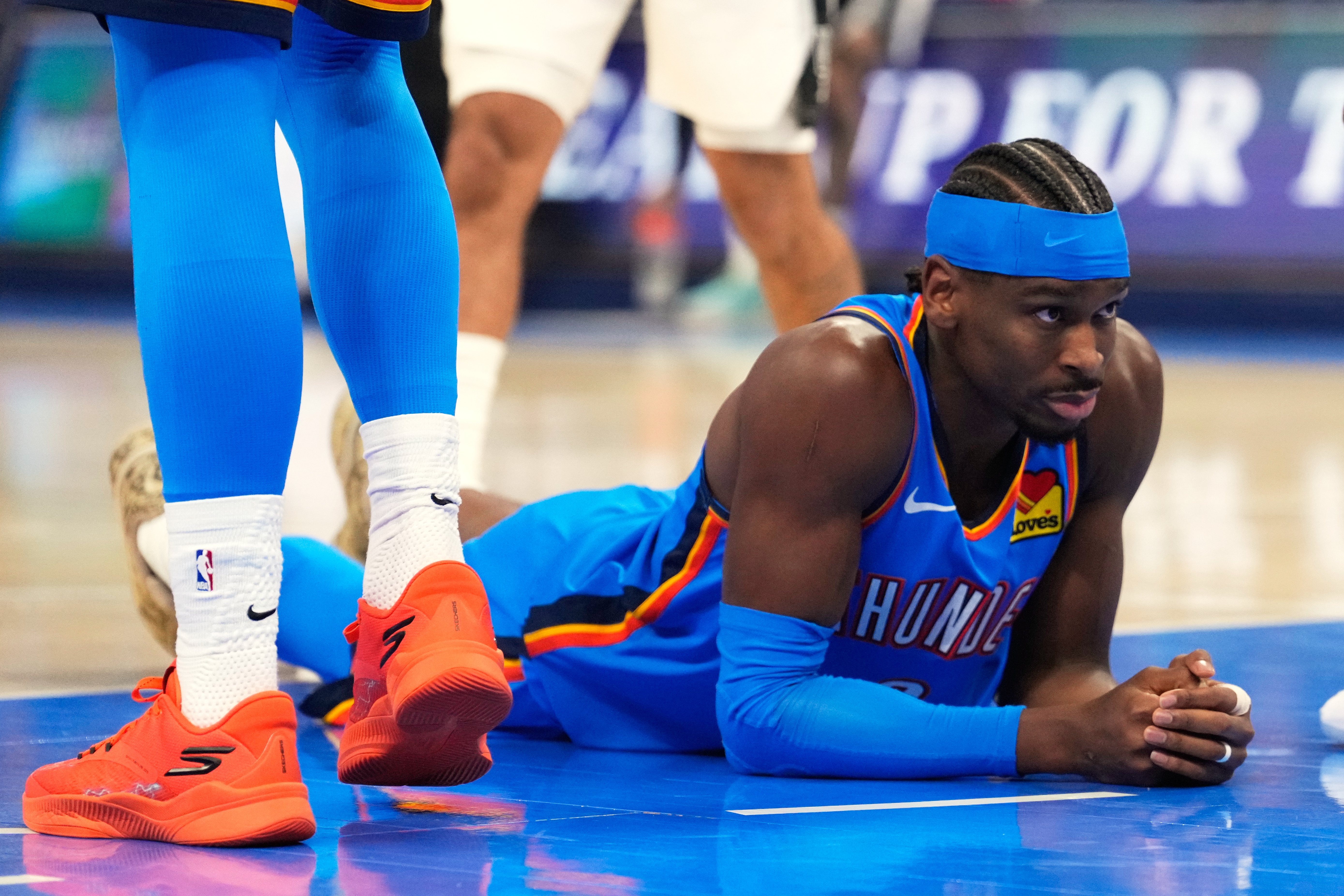 Oklahoma City Thunder guard Shai Gilgeous-Alexander reacts after making a shot during the first half of Game 2 in the Western Conference finals NBA basketball playoffs series against the San Antonio Spurs Wednesday, May 20, 2026, in Oklahoma City. (AP Photo/Tony Gutierrez)