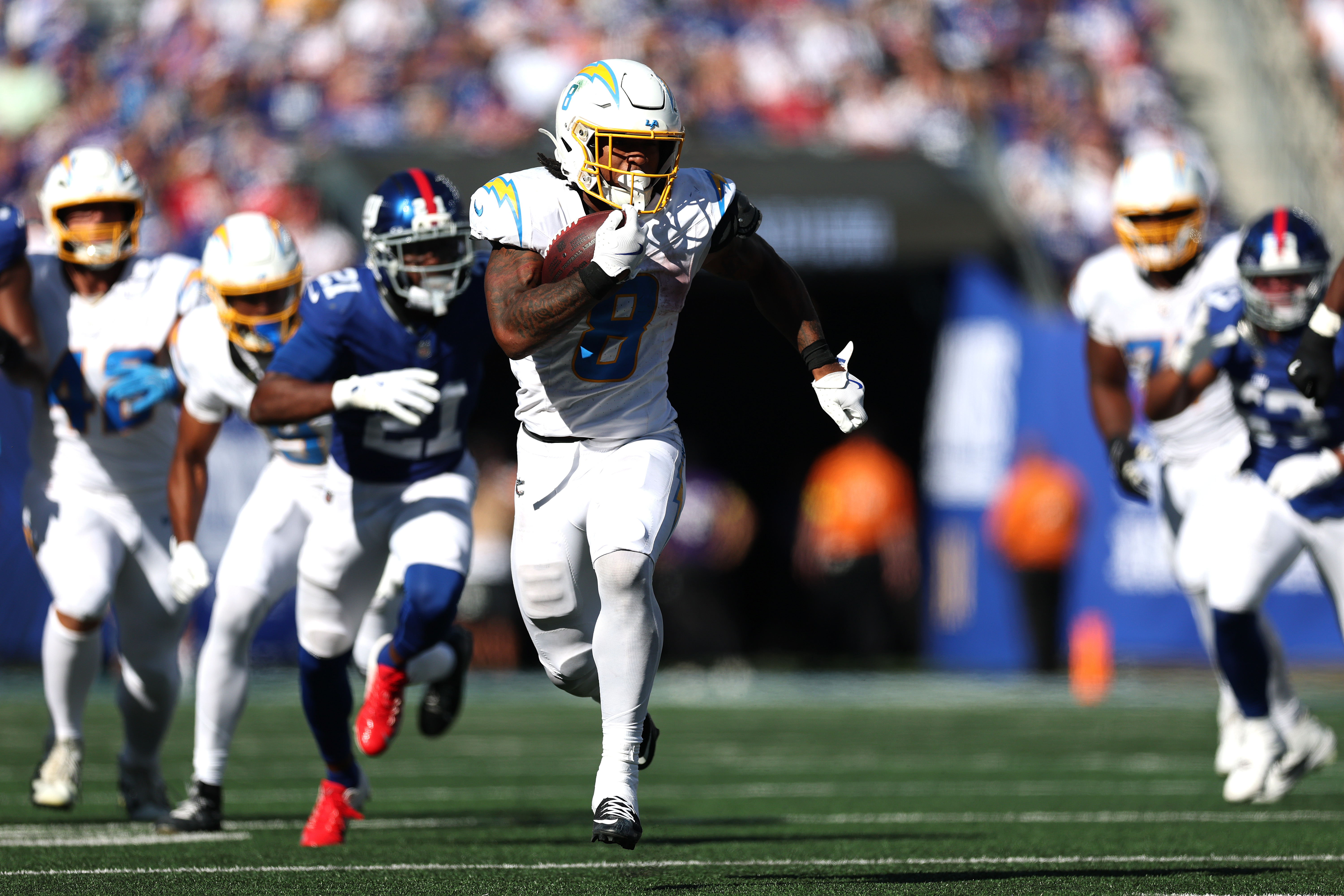 Omarion Hampton (8) could shine in Mike McDaniel's new Chargers offense. (Photo by Ishika Samant/Getty Images)