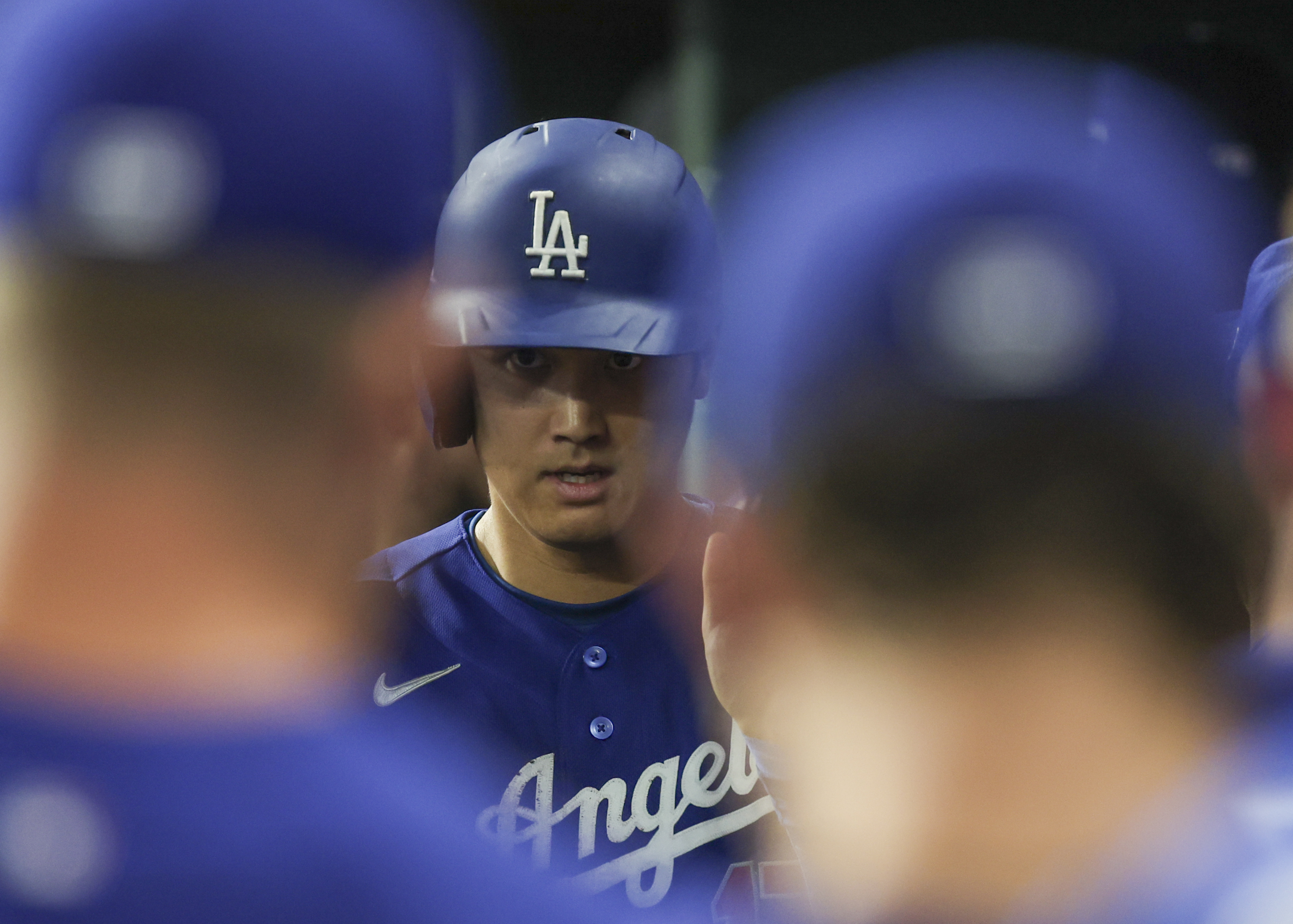 HOUSTON, TX - MAY 04:  Los Angeles Dodgers designated hitter Shohei Ohtani (17) gets high fives from teammates after scoring a run in the top of the second inning during the MLB game between the Los Angeles Dodgers and Houston Astros on May 4, 2026 at Daikin Park in Houston, Texas.  (Photo by Leslie Plaza Johnson/Icon Sportswire via Getty Images)
