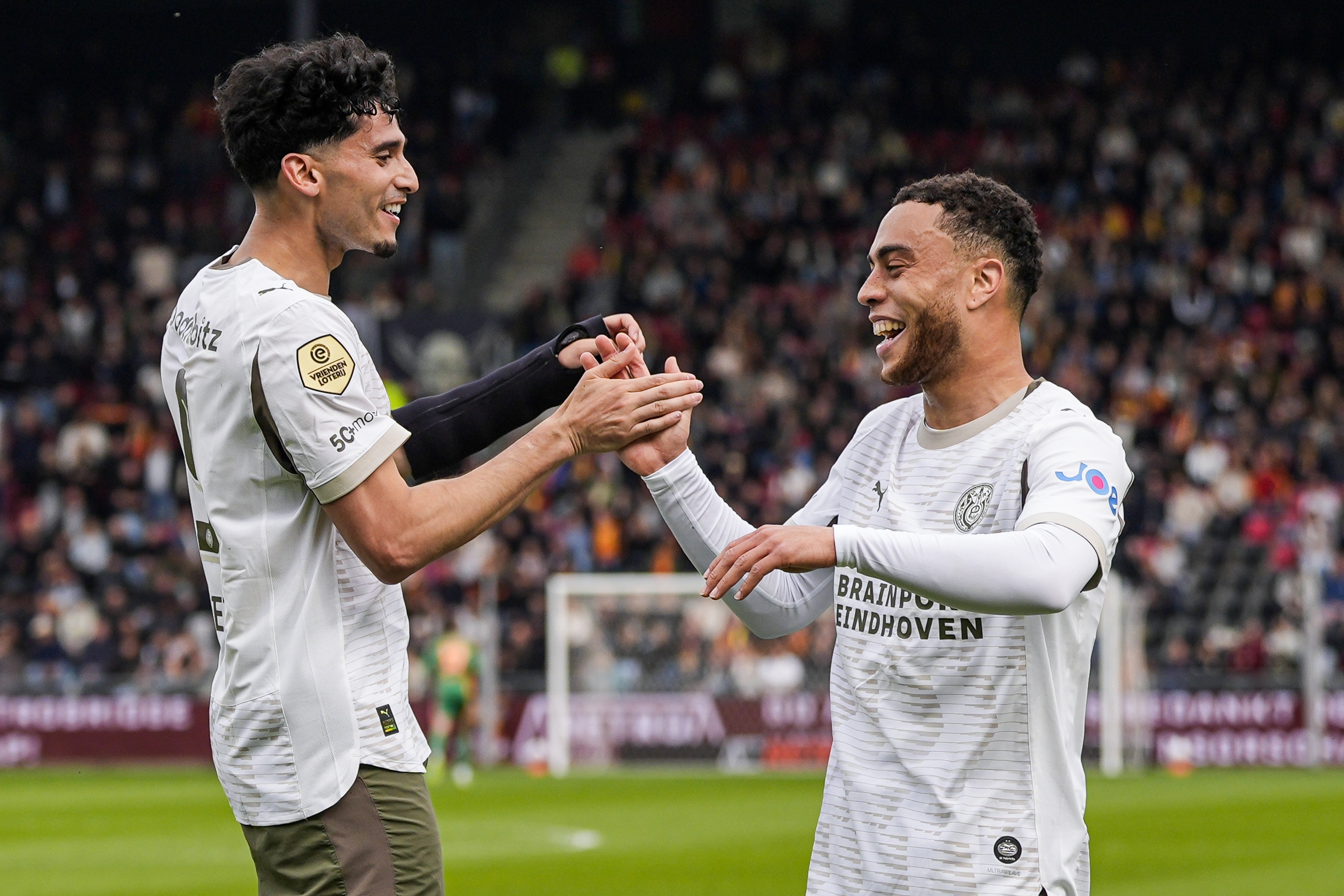 DEVENTER - (lr) Ricardo Pepi of PSV Eindhoven, Sergino Dest of PSV Eindhoven celebrate the 2-1 during the Dutch Eredivisie match between Go Ahead Eagles and PSV at De Adelaarshorst on May 10, 2026 in Deventer, the Netherlands. TOBIAS KLEUVER / ANP (Photo by ANP via Getty Images)
