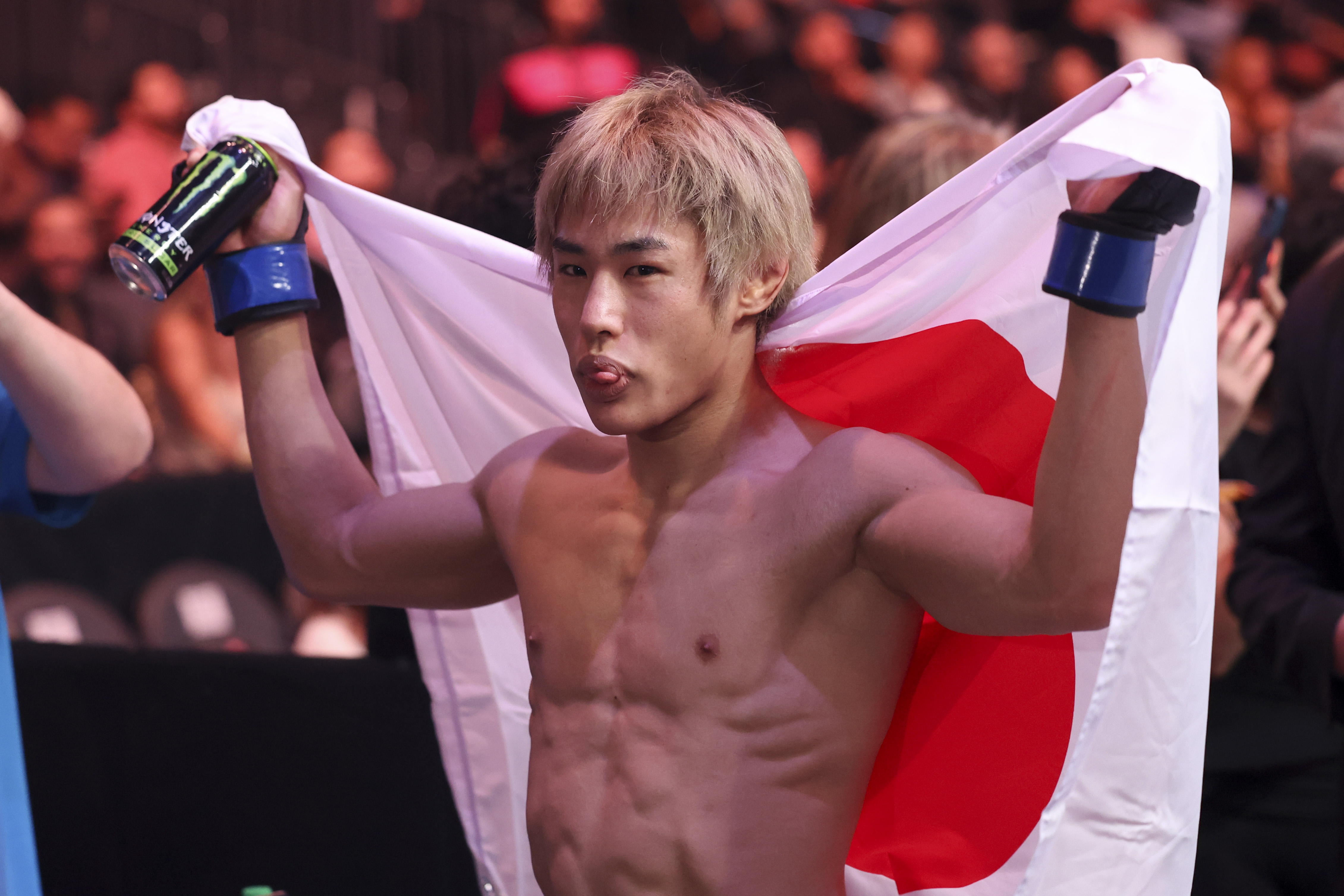 LAS VEGAS, NEVADA - DECEMBER 06: Tatsuro Taira of Japan celebrates after his flyweight fight victory at T-Mobile Arena on December 06, 2025 in Las Vegas, Nevada. (Photo by Ian Maule/Getty Images)