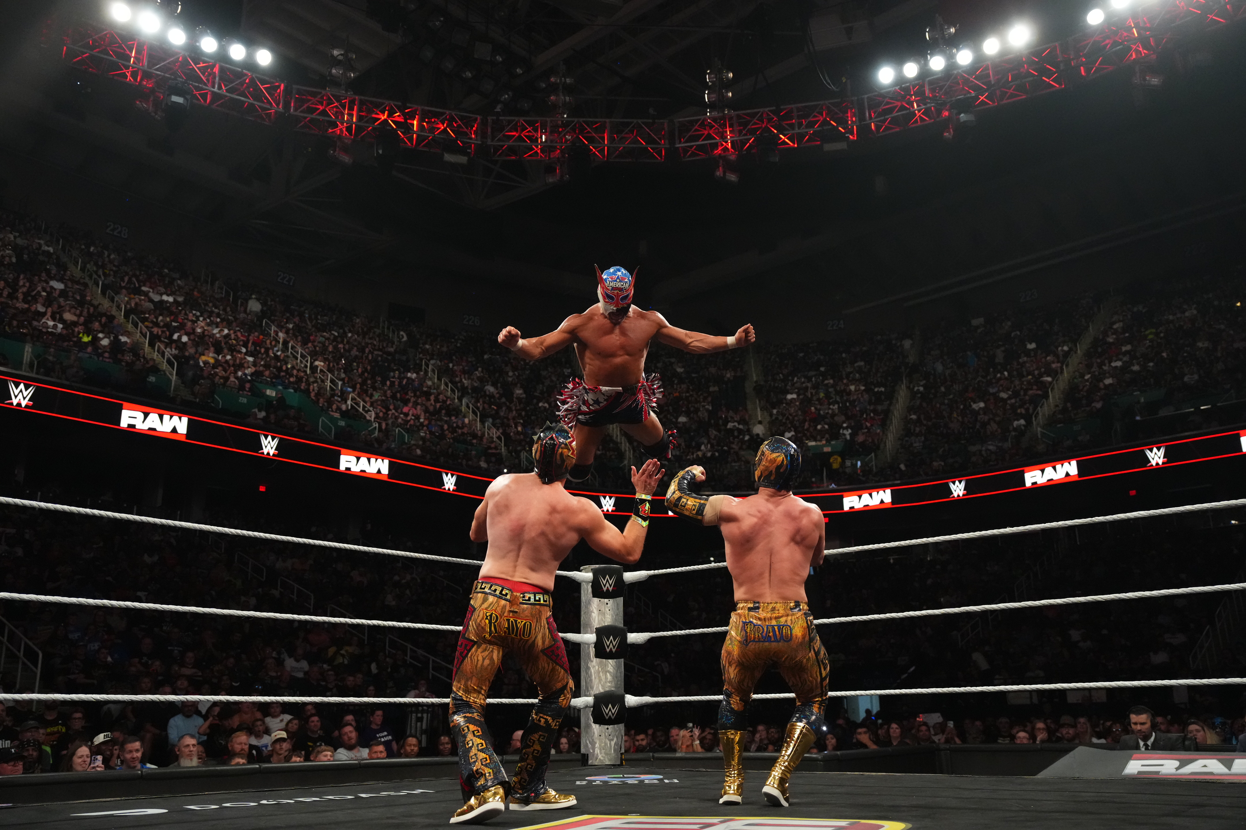 GREENSBORO, NORTH CAROLINA - MAY 18: "Original" El Grande Americano flies off the top rope onto Rayo Americano and Bravo Americano during Monday Night RAW at Greensboro Coliseum Complex on May 18, 2026 in Greensboro, North Carolina.  (Photo by Michael Owens/WWE via Getty Images)