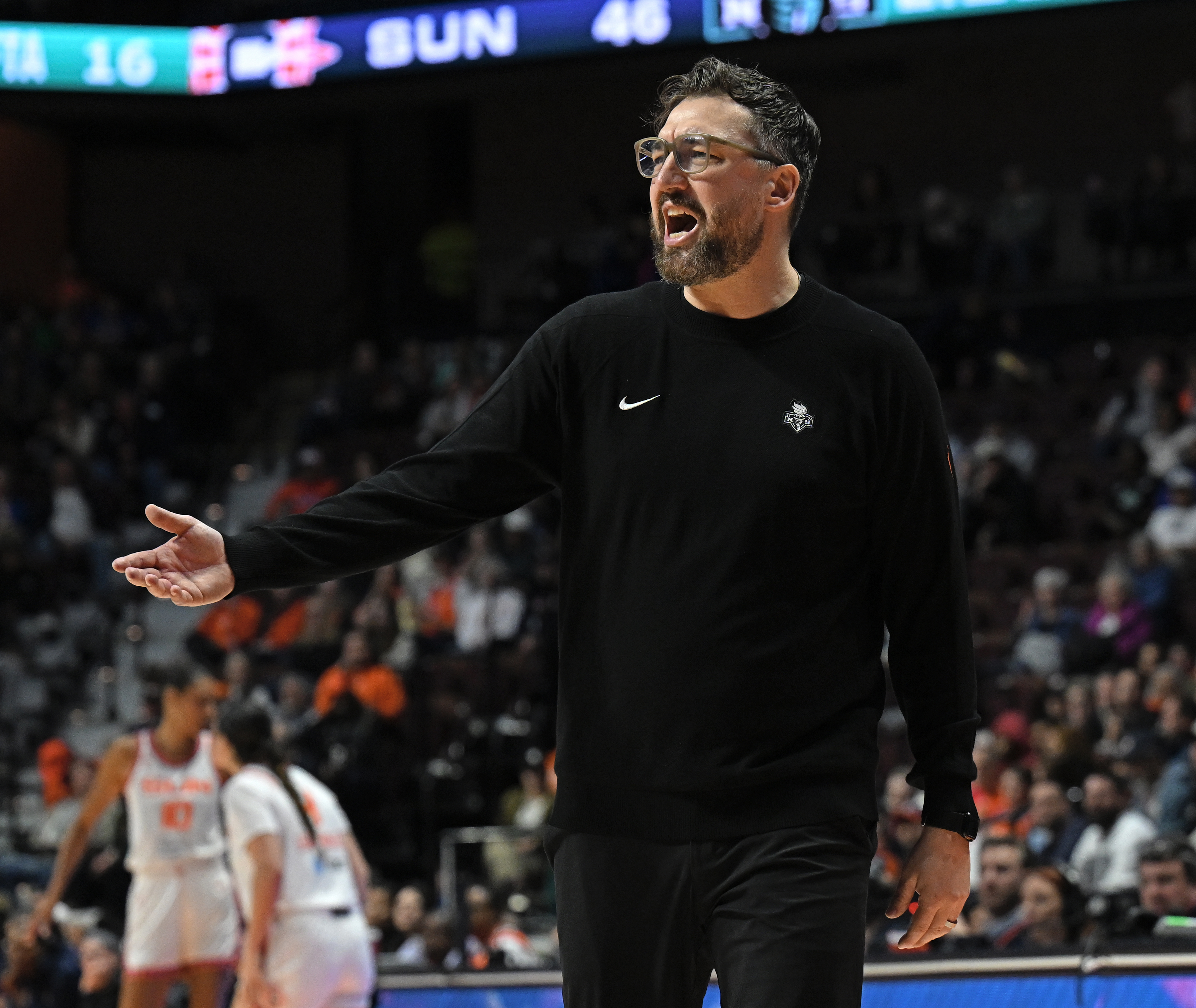 UNCASVILLE, CONNECTICUT - MAY 03: Chris DeMarco of the New York Liberty argues a call during play against the Connecticut Sun in the second half at Mohegan Sun Arena on May 3, 2026 in Uncasville, Connecticut. NOTE TO USER: User expressly acknowledges and agrees that, by downloading and or using this photograph, User is consenting to the terms and conditions of the Getty Images License Agreement. (Photo by Sean D. Elliot/Getty Images)