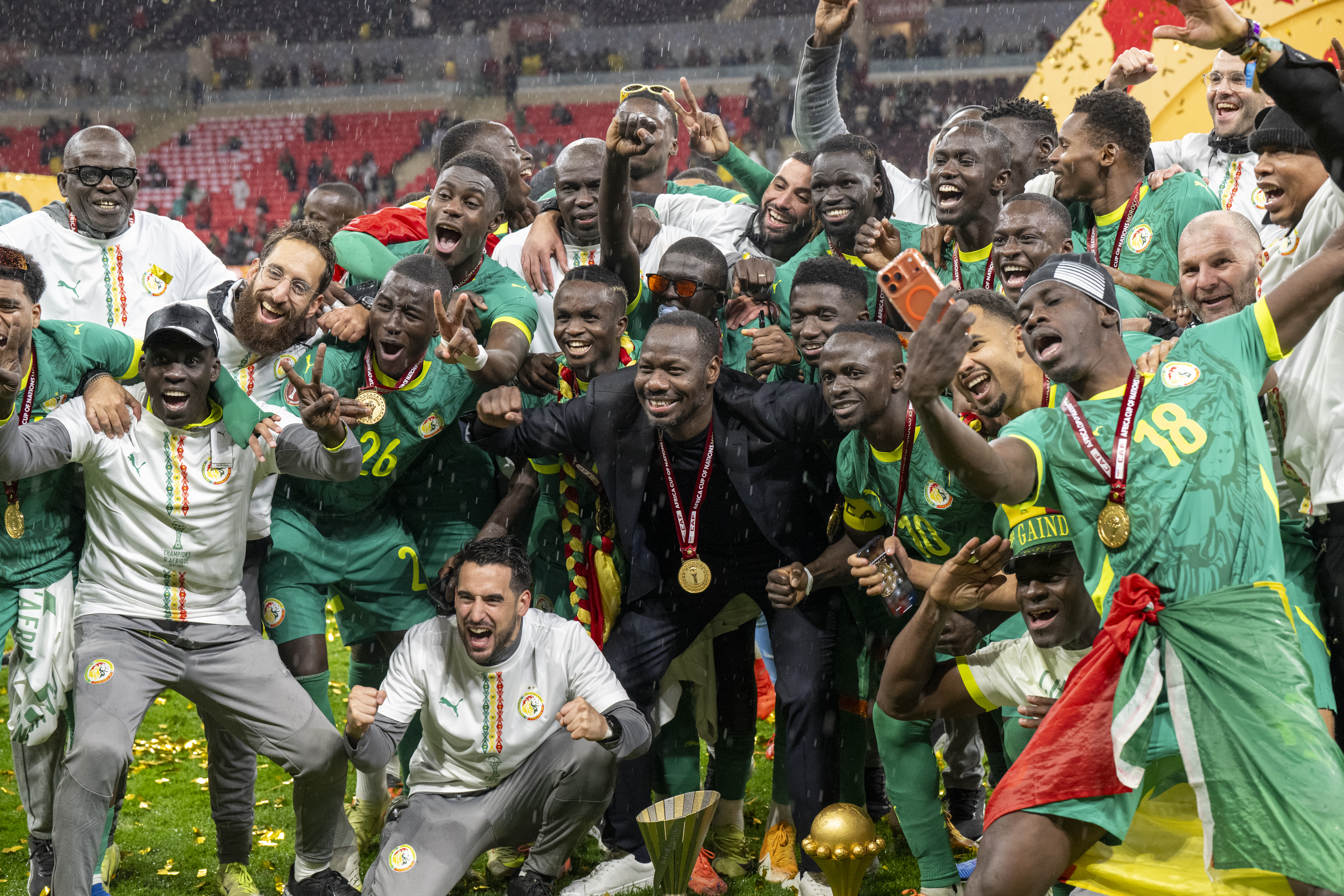 RABAT, MOROCCO - JANUARY 19: Senegalese players raise the trophy after winning the 35th Africa Cup of Nations (AFCON 2025) final match against Morocco at the Prince Moulay Abdellah Stadium in the capital Rabat, Morocco on January 19, 2026. Senegal won the 35th Africa Cup of Nations title on Sunday, defeating hosts Morocco 1-0 after extra time in a dramatic final marked by lengthy stoppage-time scenes. (Photo by Abu Adem Muhammed/Anadolu via Getty Images)
