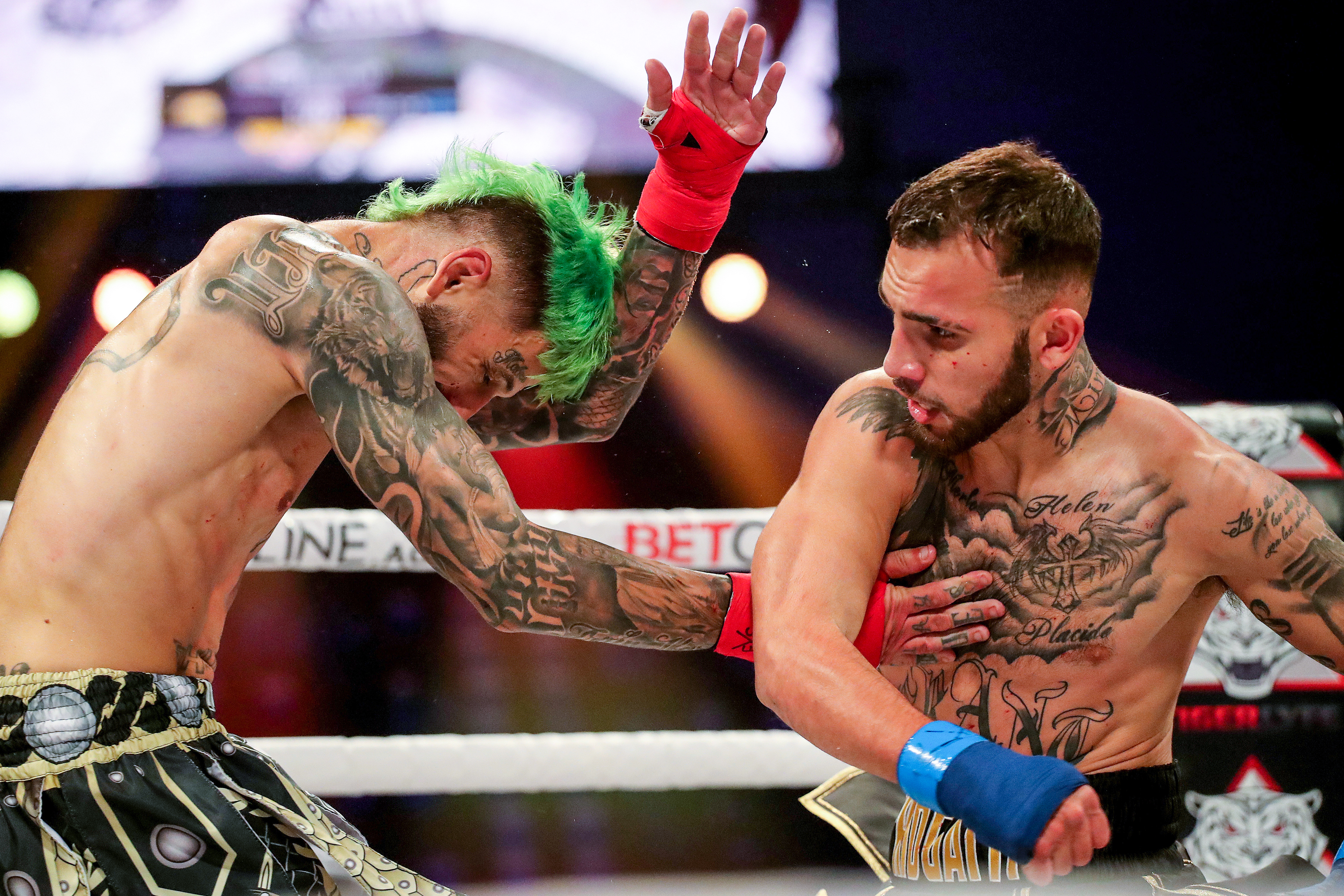 TAMPA, FL - FEBRUARY 05: Brandon Lambert punches Jarod Grant during the BKFC KnuckleMania event at RP Funding Center on February 5, 2021 in Tampa, Florida. (Photo by Alex Menendez/Getty Images)