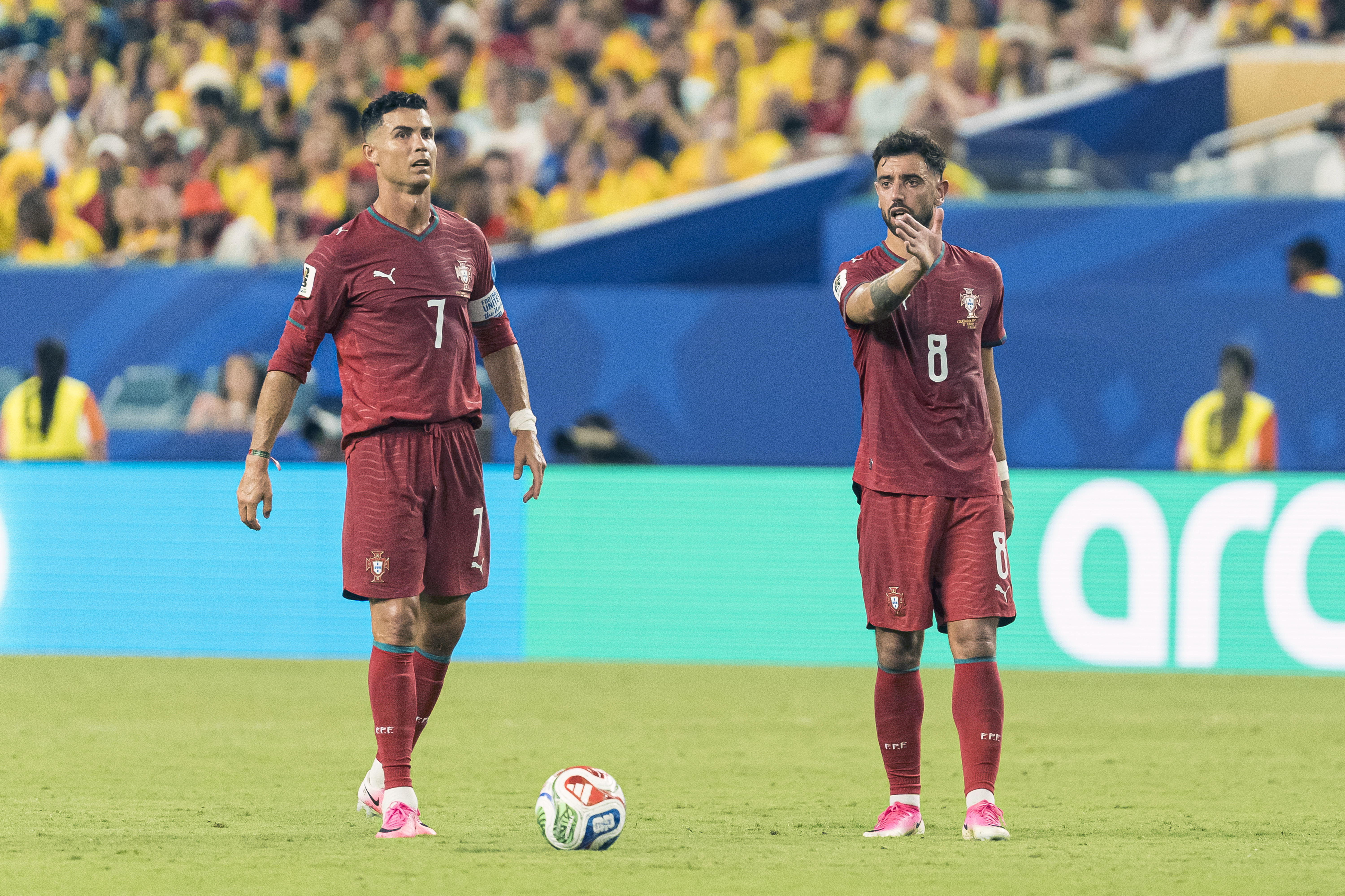 MIAMI GARDENS, FLORIDA - JUNE 27: Cristiano Ronaldo (L) and Bruno Fernandes of Portugal (R) prepare to take a free kick during the FIFA World Cup 2026 Group K match between Colombia and Portugal at Miami Stadium on June 27, 2026 in Miami Gardens, United States. (Photo by Calvin Hernandez/Eurasia Sport Images/Getty Images)