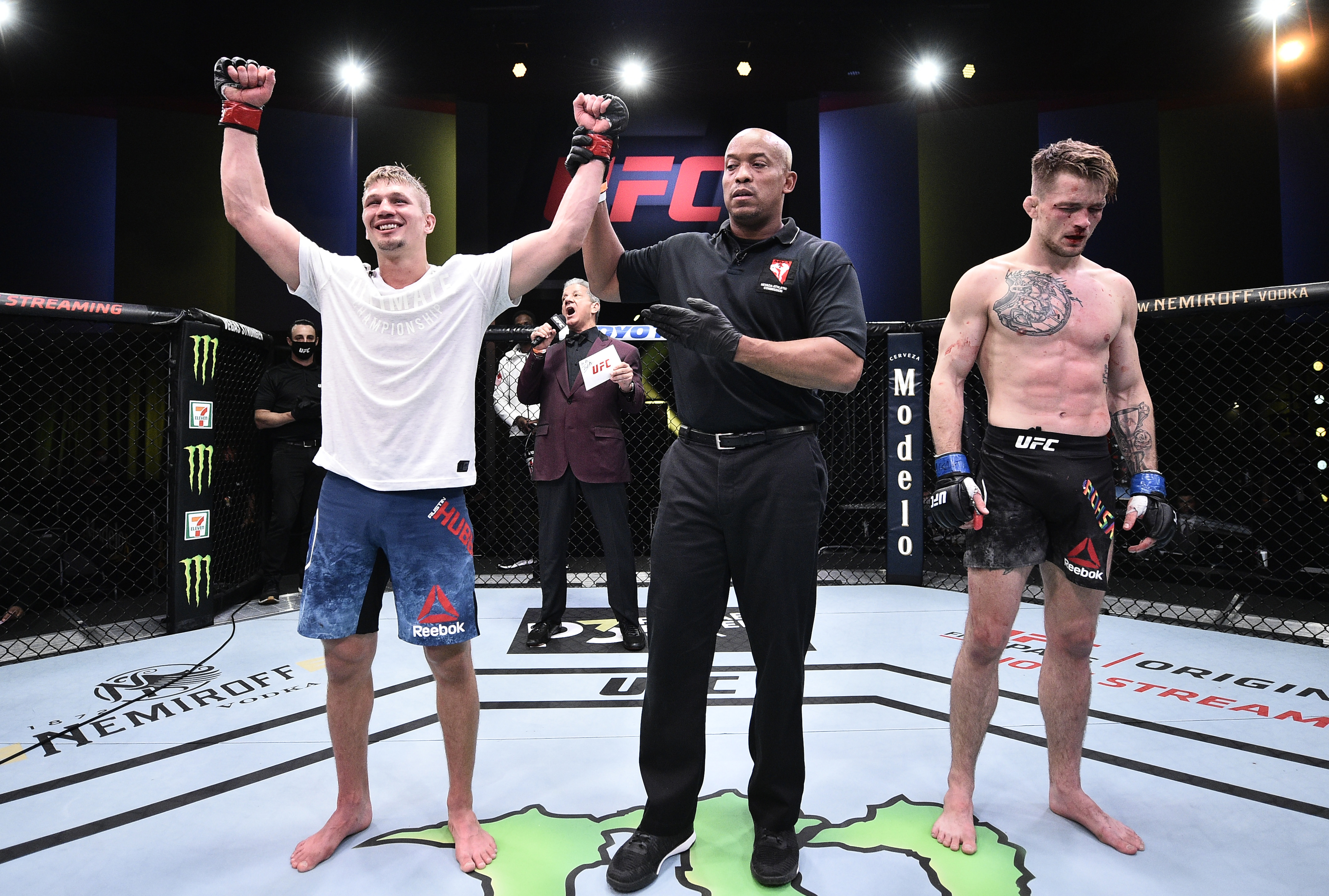 LAS VEGAS, NEVADA - JUNE 20: In this handout image provided by UFC, Austin Hubbard celebrates after his victory over Max Rohskopf in their lightweight bout during the UFC Fight Night event  at UFC APEX on June 20, 2020 in Las Vegas, Nevada. (Photo by Chris Unger/Zuffa LLC via Getty Images)