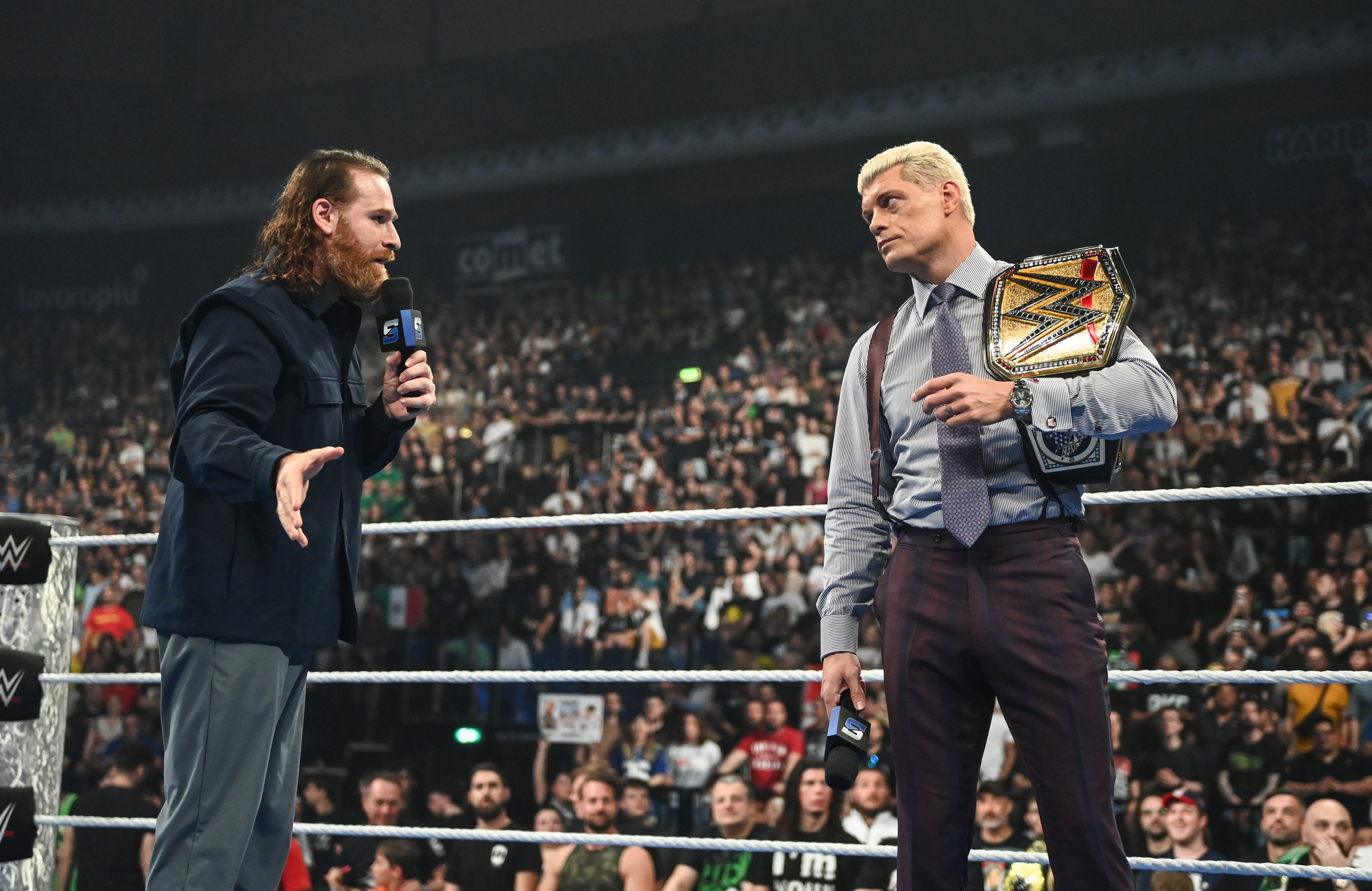 BOLOGNA, ITALY - JUNE 5: Sami Zayn and Undisputed WWE Champion Cody Rhodes speak during SmackDown at Unipol Arena on June 5, 2026 in Bologna, Italy. (Photo by Andrew Timms/WWE via Getty Images)