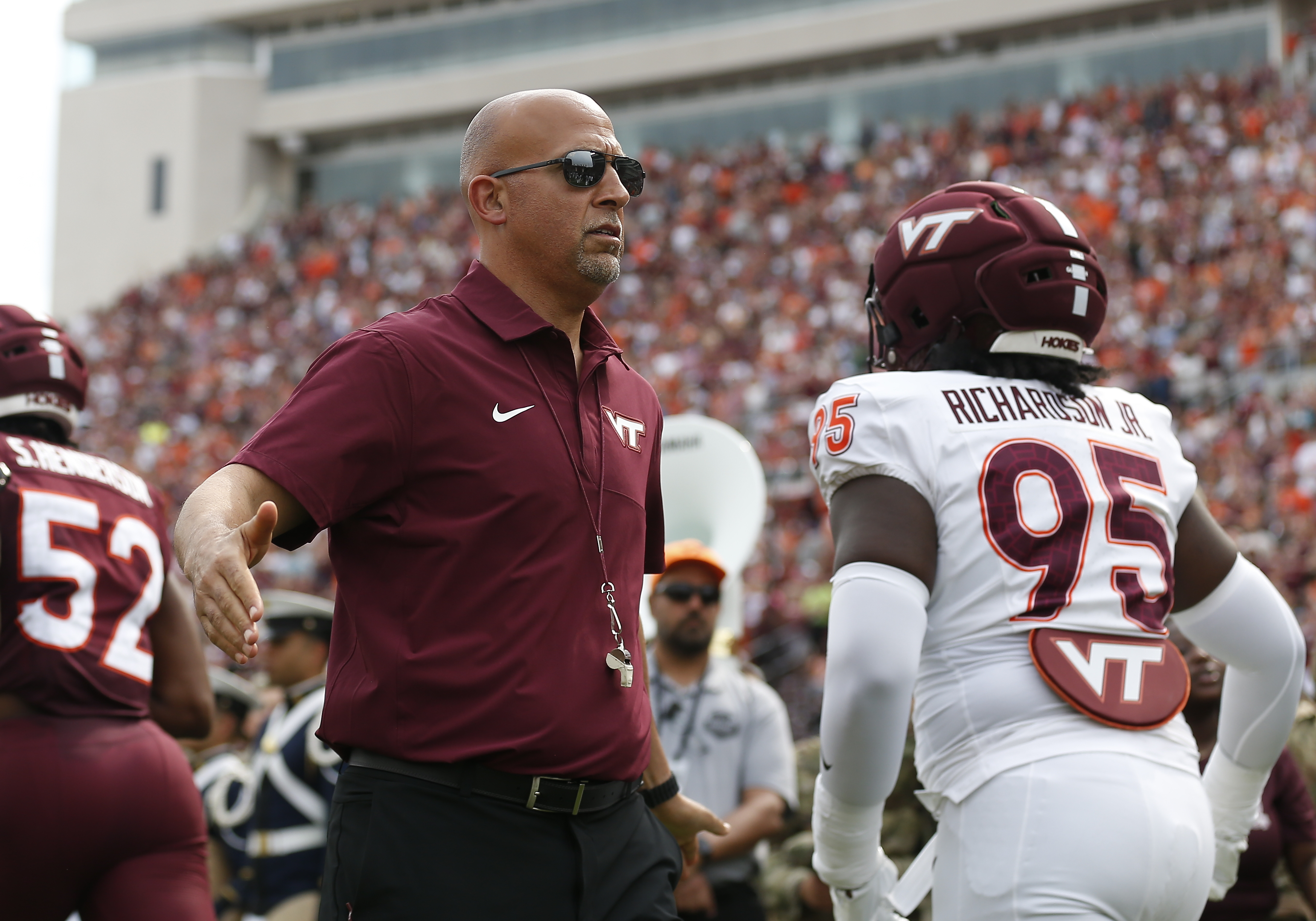 BLACKSBURG, VA - APRIL 18: Virginia Tech Hokies Head Coach James Franklin daps up Hokies defensive lineman T-Ron Richardson Jr. (95) prior to the Virginia Tech spring football game on April 18, 2026, at Lane Stadium in Blacksburg, VA. (Photo by Lee Coleman/Icon Sportswire via Getty Images)
