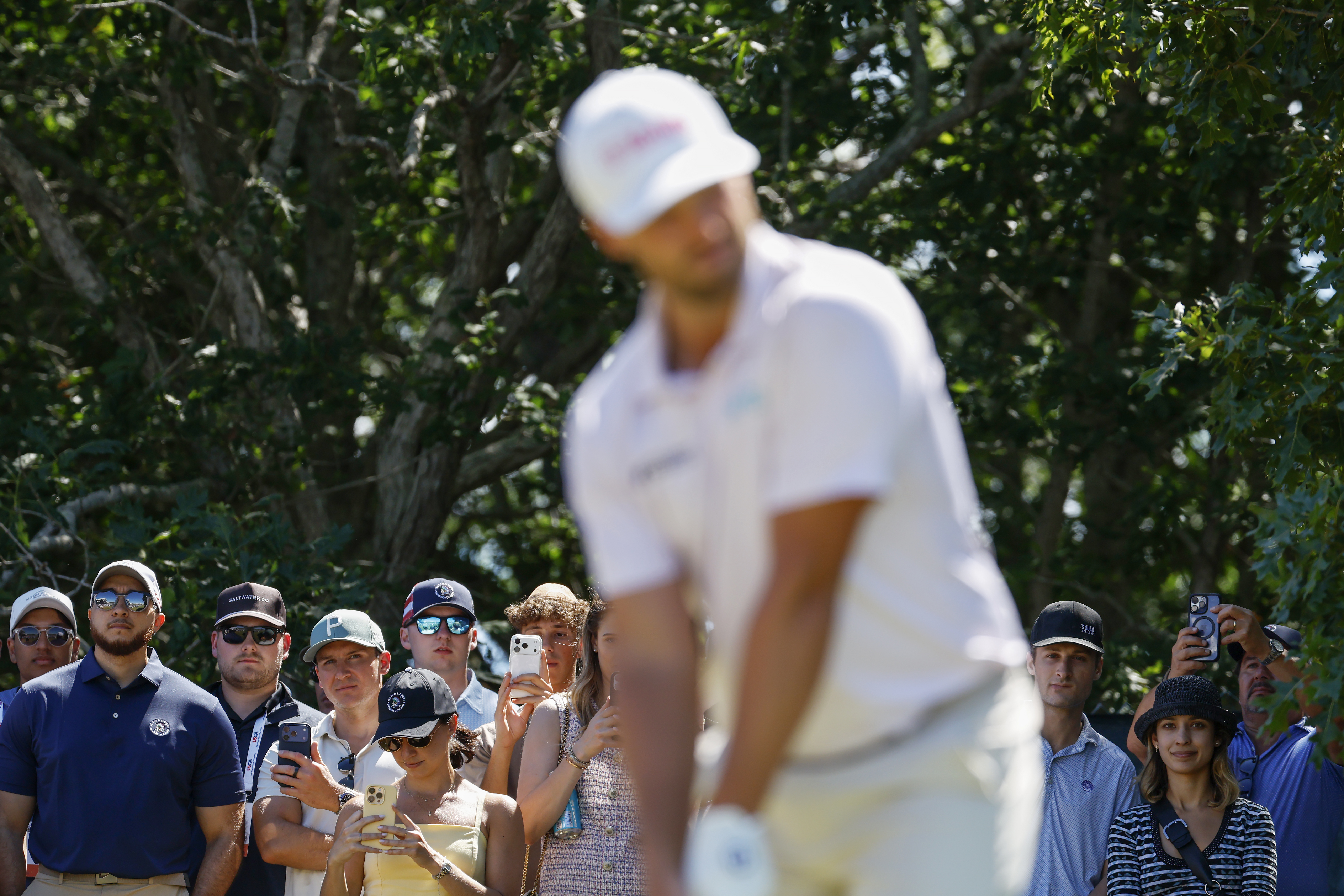 SOUTHAMPTON, NEW YORK - JUNE 21: Fans watch as Wyndham Clark of the United States prepares to play a shot on the second hole during the final round of the 126th U.S. OPEN at Shinnecock Hills Golf Club on June 21, 2026 in Southampton, New York. (Photo by Cliff Hawkins/Getty Images)