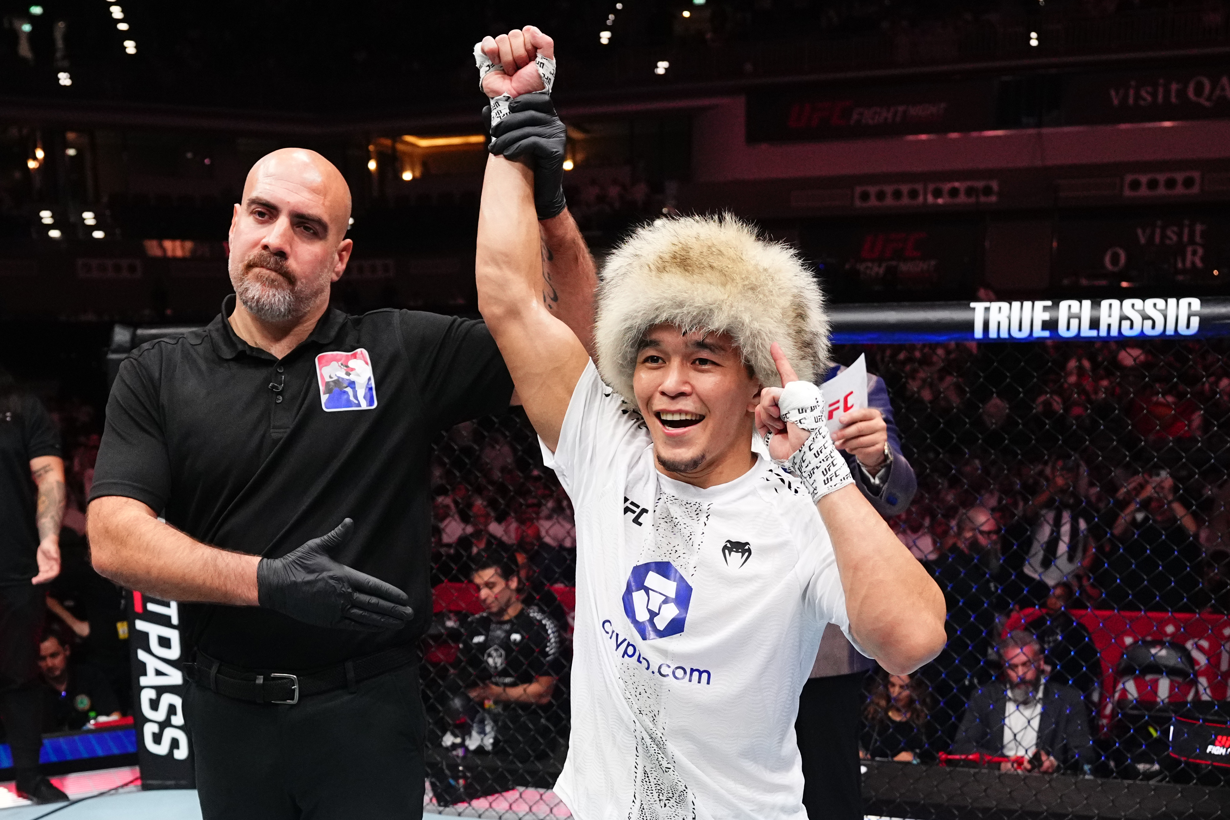 DOHA, QATAR - NOVEMBER 22: Asu Almabayev of Kazakstan reacts after a victory against Alex Perez in a flyweight fight during the UFC Fight Night event at ABHA Arena on November 22, 2025 in Doha, Qatar.  (Photo by Jeff Bottari/Zuffa LLC)