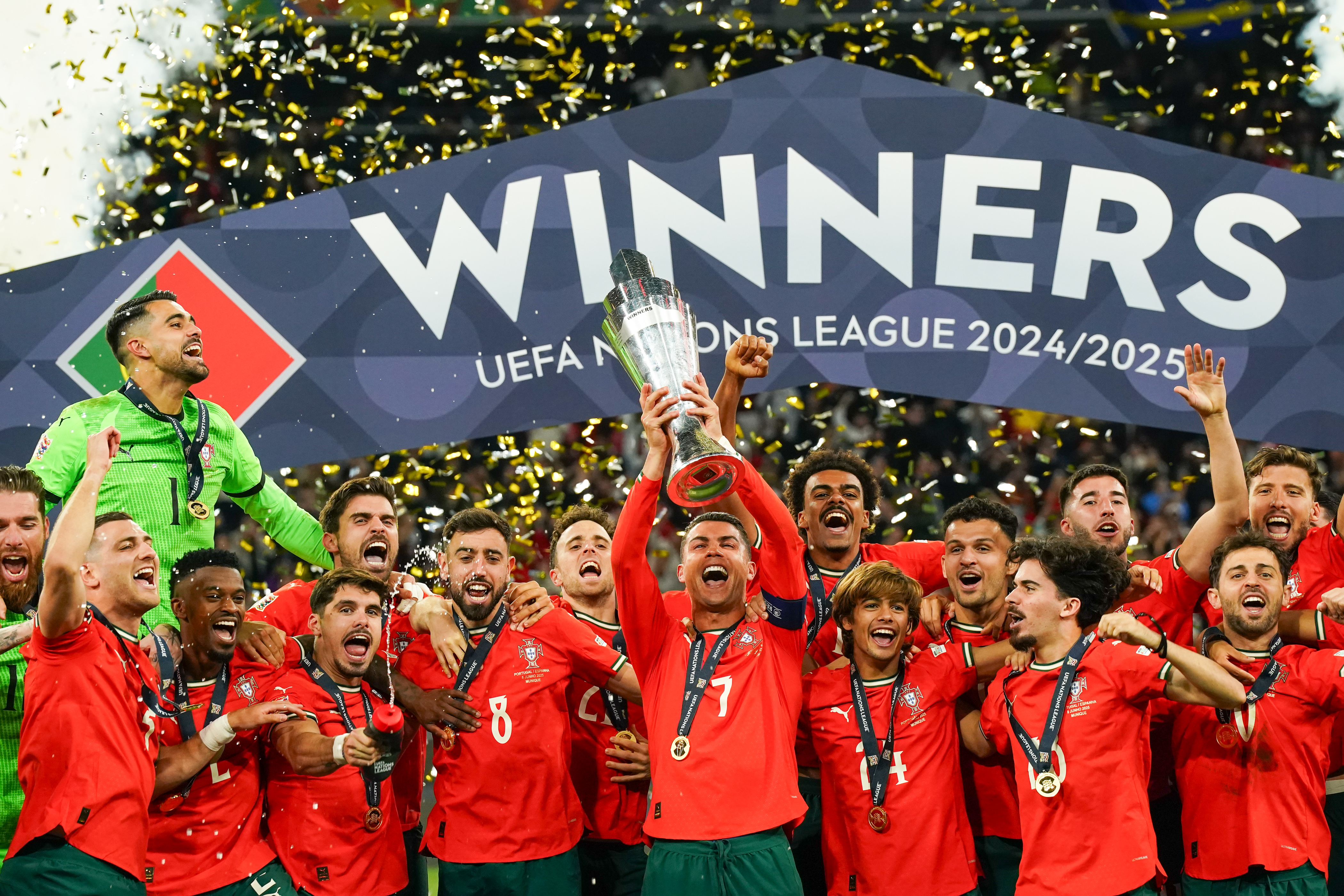 MUNICH, GERMANY - JUNE 08: Cristiano Ronaldo of Portugal lifts the trophy during the ceremony after winning the UEFA Nations League 2025 final match between Portugal and Spain at Munich Football Arena on June 08, 2025 in Munich, Germany. (Photo by Daniela Porcelli/Sports Press Photo/Getty Images)