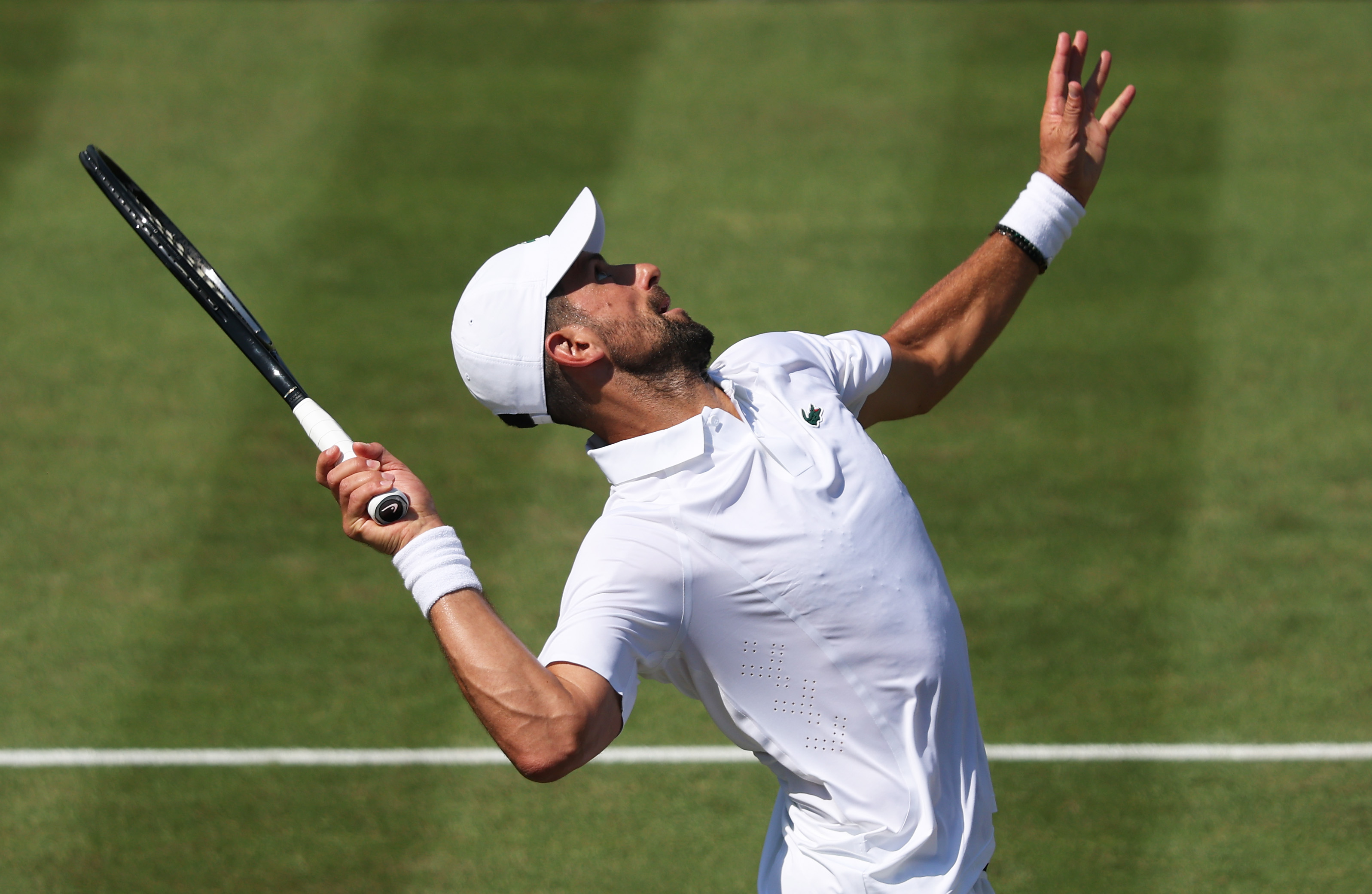 LONDON, ENGLAND - JUNE 26: Novak Djokovic of Serbia serves against Tommy Paul of the United States during the Giorgio Armani Tennis Classic at The Hurlingham Club on June 26, 2026 in London, England. (Photo by Clive Brunskill/Getty Images)