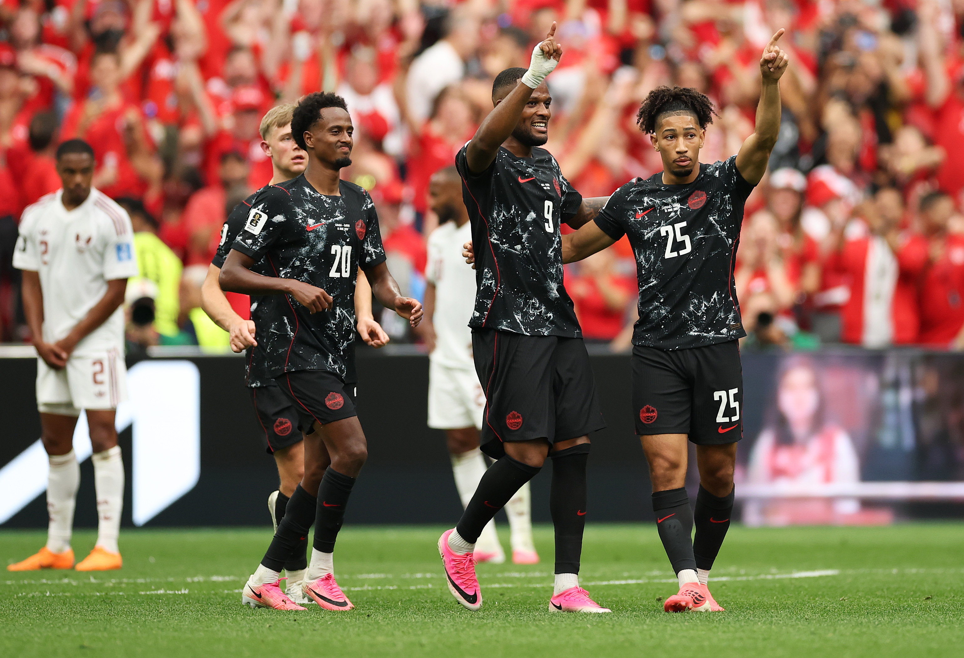 VANCOUVER, BRITISH COLUMBIA - JUNE 18: Nathan Saliba #25 of Canada celebrates with teammates after scoring his team's fourth goal during the FIFA World Cup 2026 Group B match between Canada and Qatar at BC Place Vancouver on June 18, 2026 in Vancouver, British Columbia. (Photo by Jared C. Tilton - FIFA/FIFA via Getty Images)