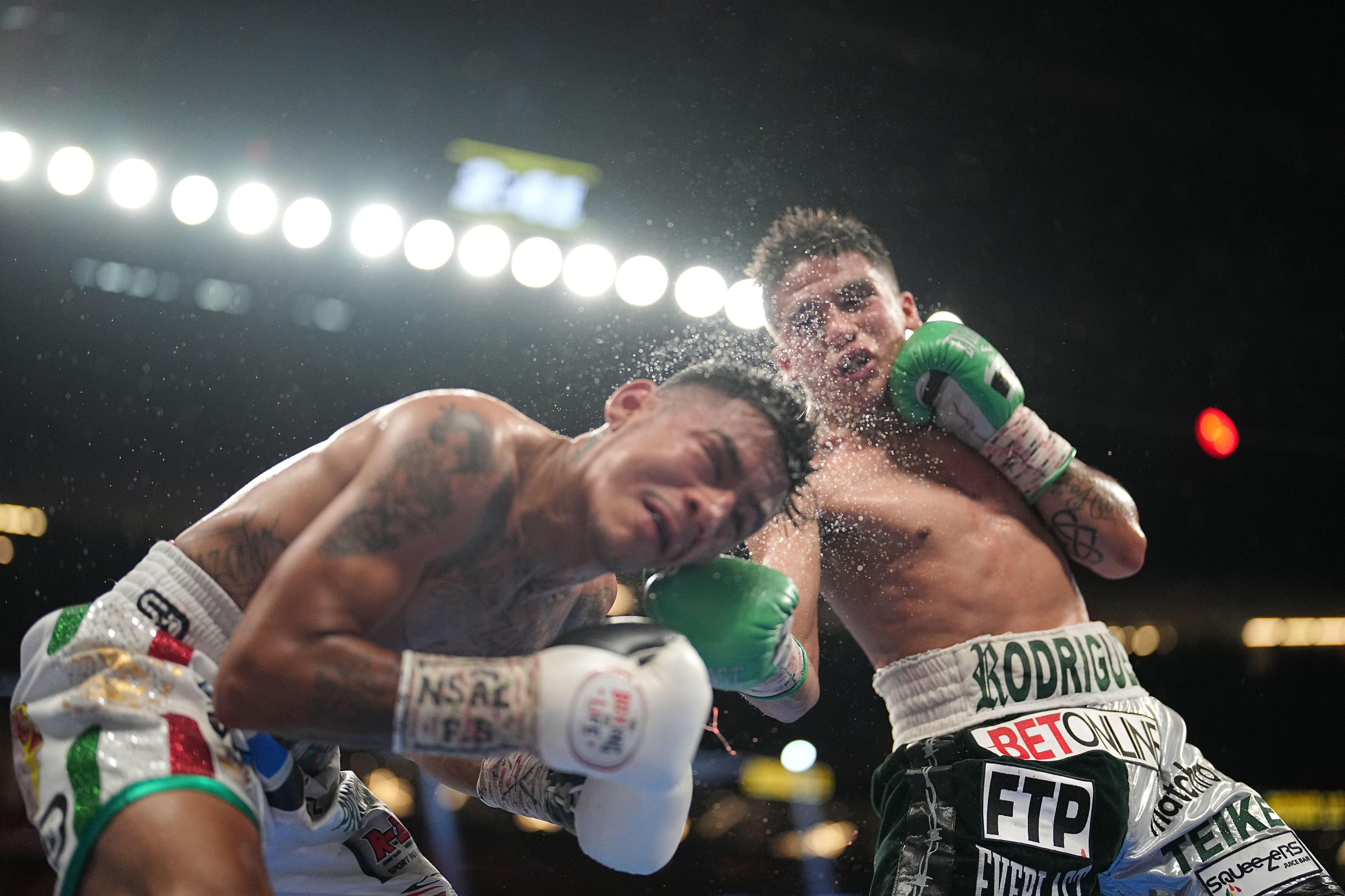 Boxing: WBC World Super Flyweight Title: Jesse Rodriguez (R) in action, lands a punch vs Israel Gonzalez during fight at T-Mobile Arena. Las Vegas, NV 9/17/2022 CREDIT: Erick W. Rasco (Photo by Erick W. Rasco/Sports Illustrated via Getty Images)(Set Number: X164164 TK1)