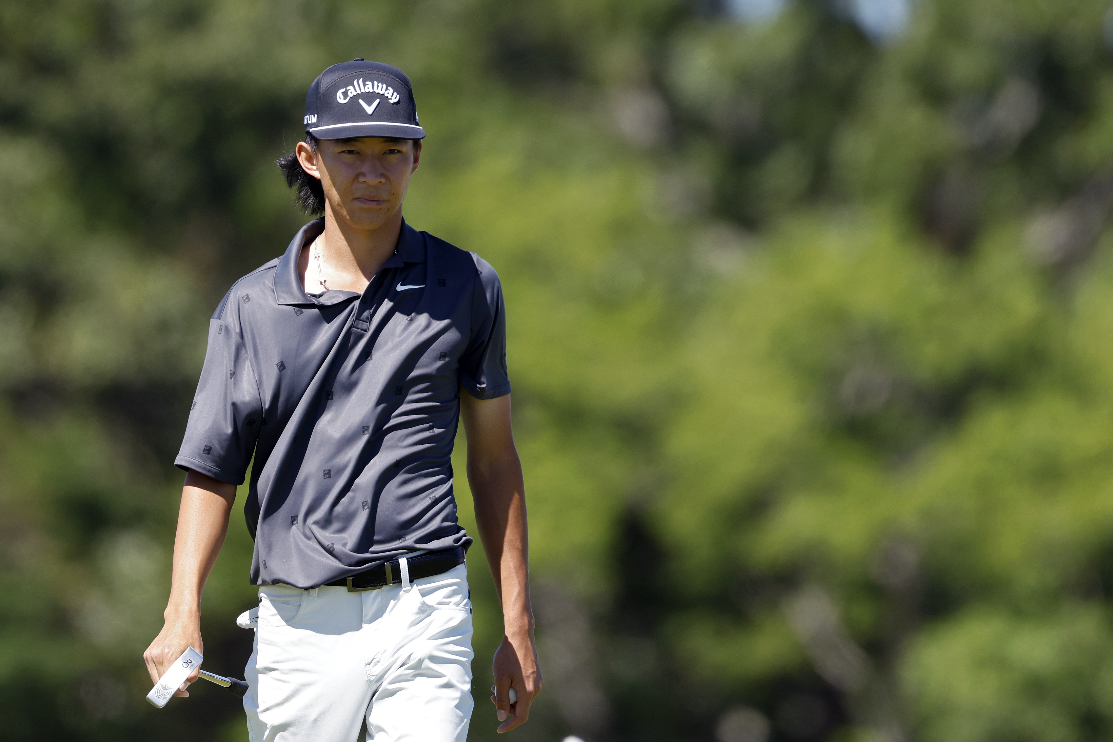 SOUTHAMPTON, NEW YORK - JUNE 15: Amateur Ethan Fang of the United States walks on the eighth green prior to the 126th 2026 U.S. OPEN at Shinnecock Hills Golf Club on June 15, 2026 in Southampton, New York. (Photo by Cliff Hawkins/Getty Images)
