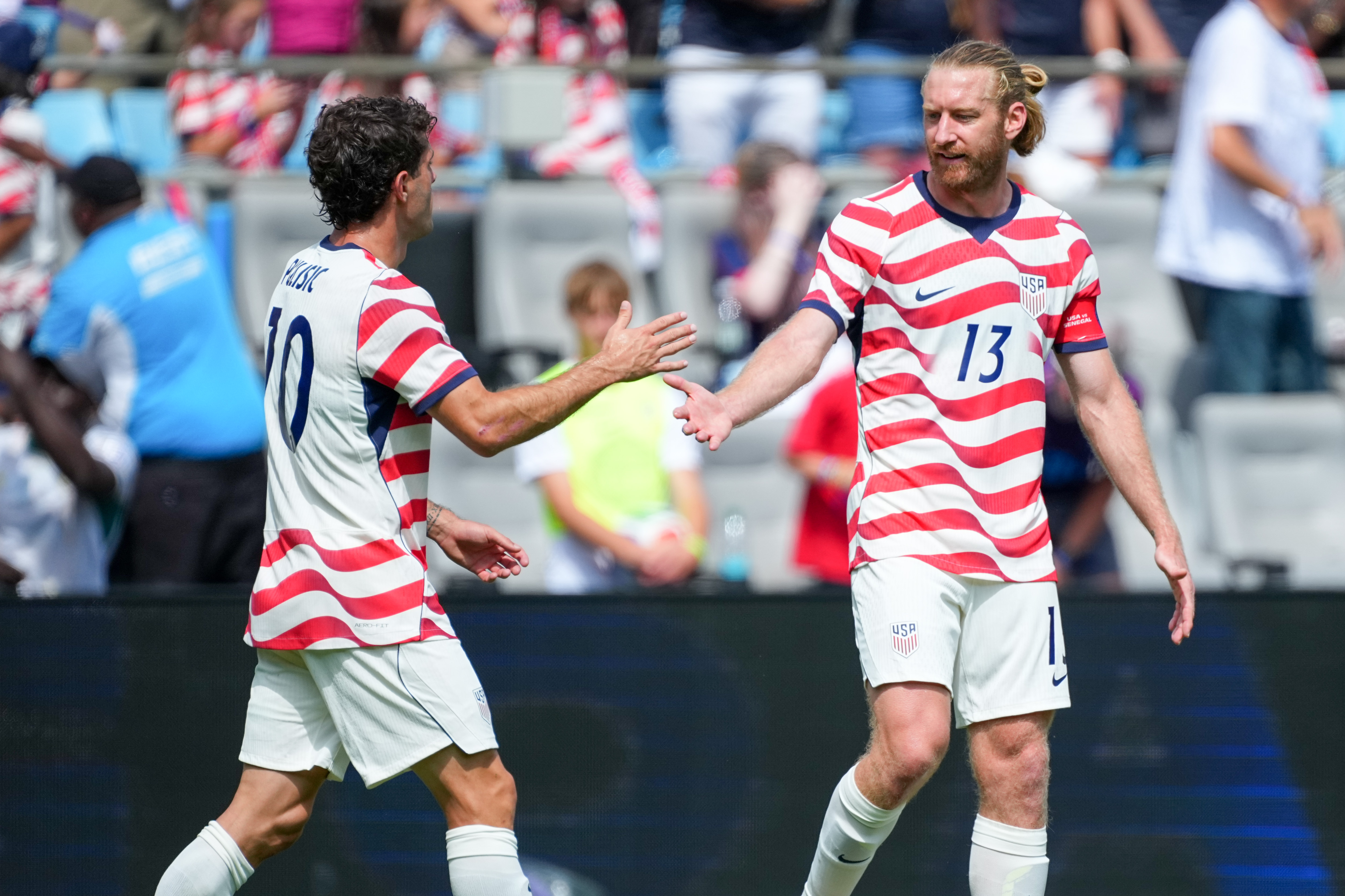 CHARLOTTE, NC - MAY 31: Christian Pulisic, #10 of the USA celebrates after scoring a goal with Tim Ream, #13 of the USA during a game between Senegal and USA at Bank of America Stadium on May 31, 2026 in Charlotte, North Carolina. (Photo by Robin Alam/ISI Photos via Getty Images)