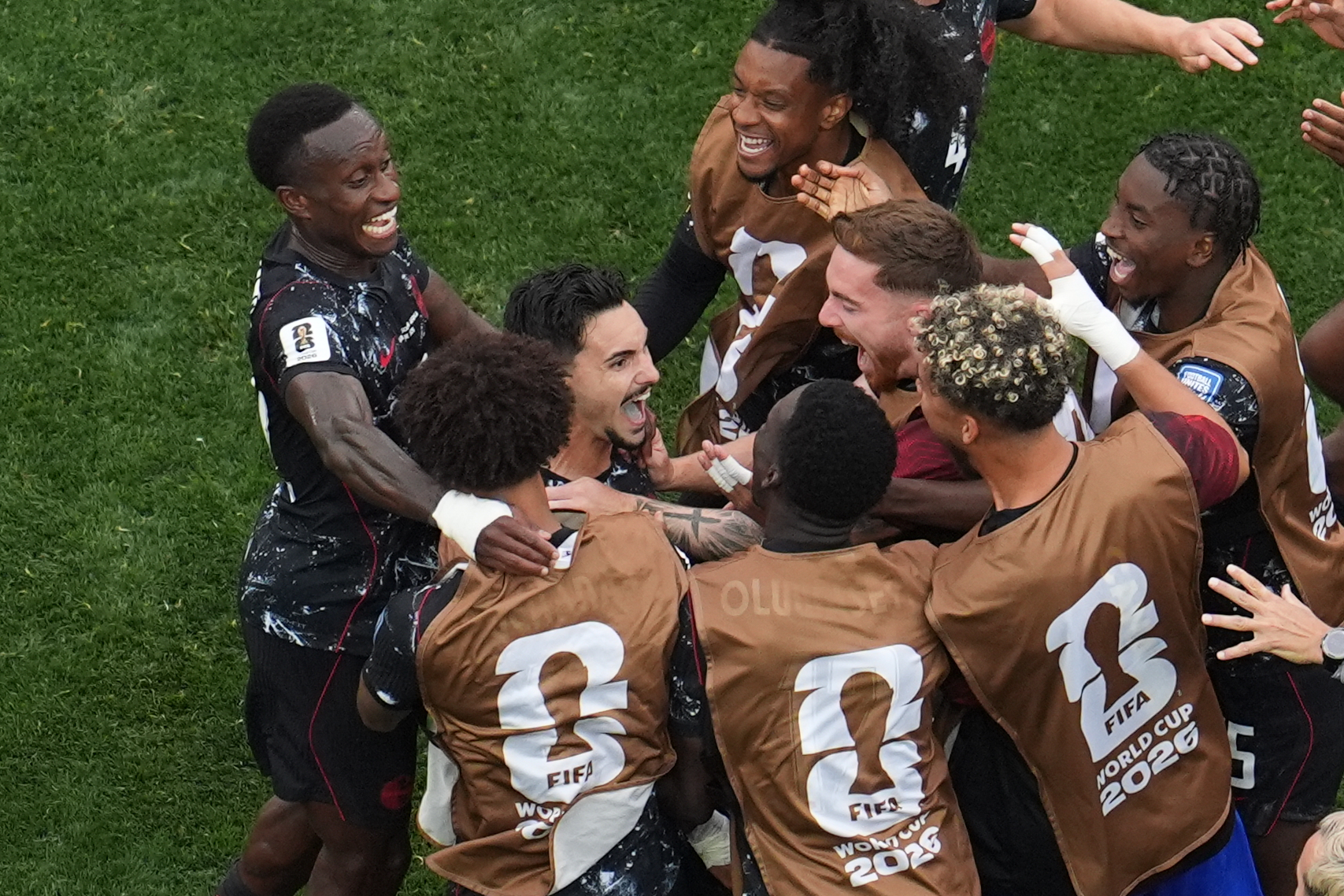 Canada's Stephen Eustaquio, second left, celebrates with teammates after scoring his side's opening goal against South Africa during the World Cup round of 32 soccer match in Inglewood, Calif., near Los Angeles, Sunday, June 28, 2026. 
