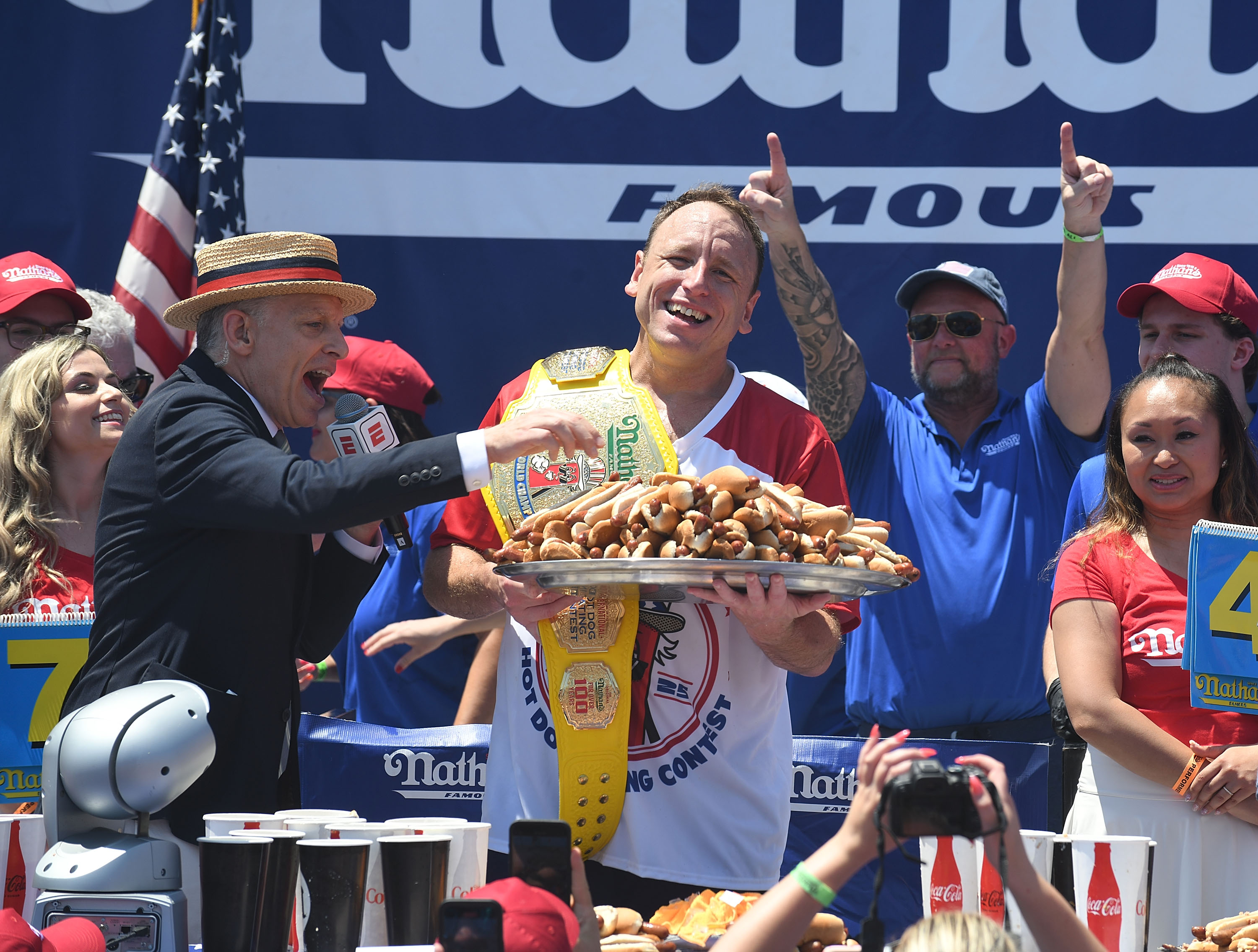 NEW YORK, NY - JULY 04:  Joey Chestnut wins the 2025 Nathan's Famous International Hot Dog Eating Contest eating 70.5 hot dogs at Coney Island on July 4, 2025 in New York City.  (Photo by Bobby Bank/Getty Images)