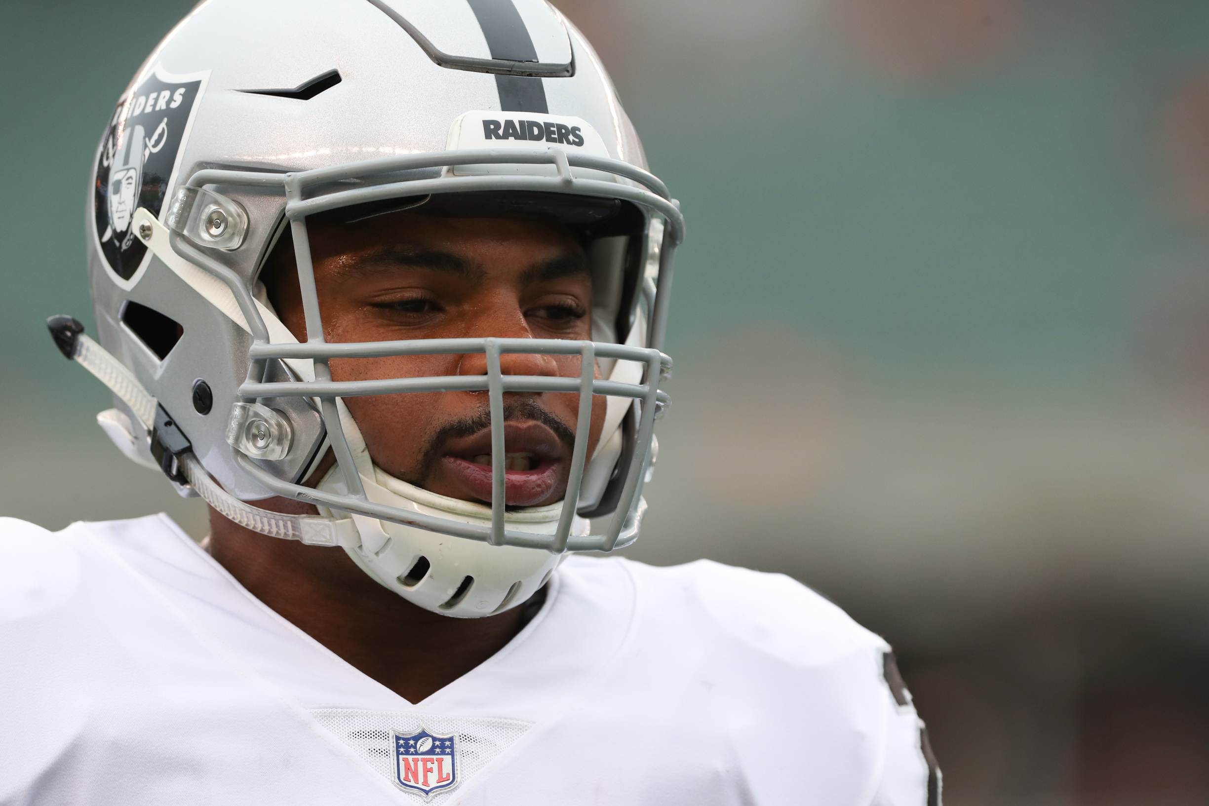 Parents of former NFL RB Doug Martin file lawsuit against Oakland after his death in police custody