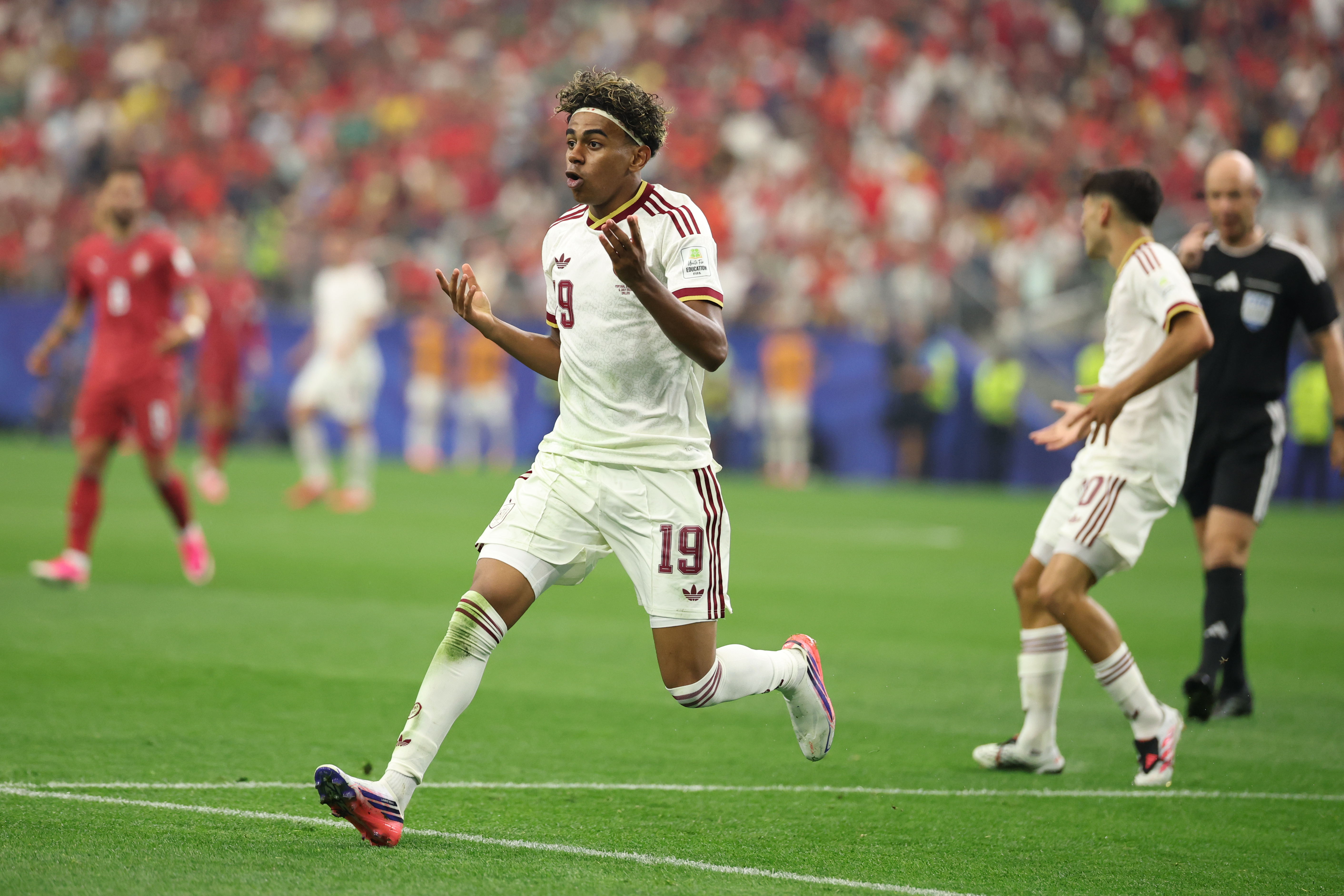 Spain's Lamine Yamal (19) reacts during the World Cup round of 16 soccer match between Portugal and Spain in Arlington, Texas, near Dallas, Monday, July 6, 2026. (AP Photo/Gareth Patterson)