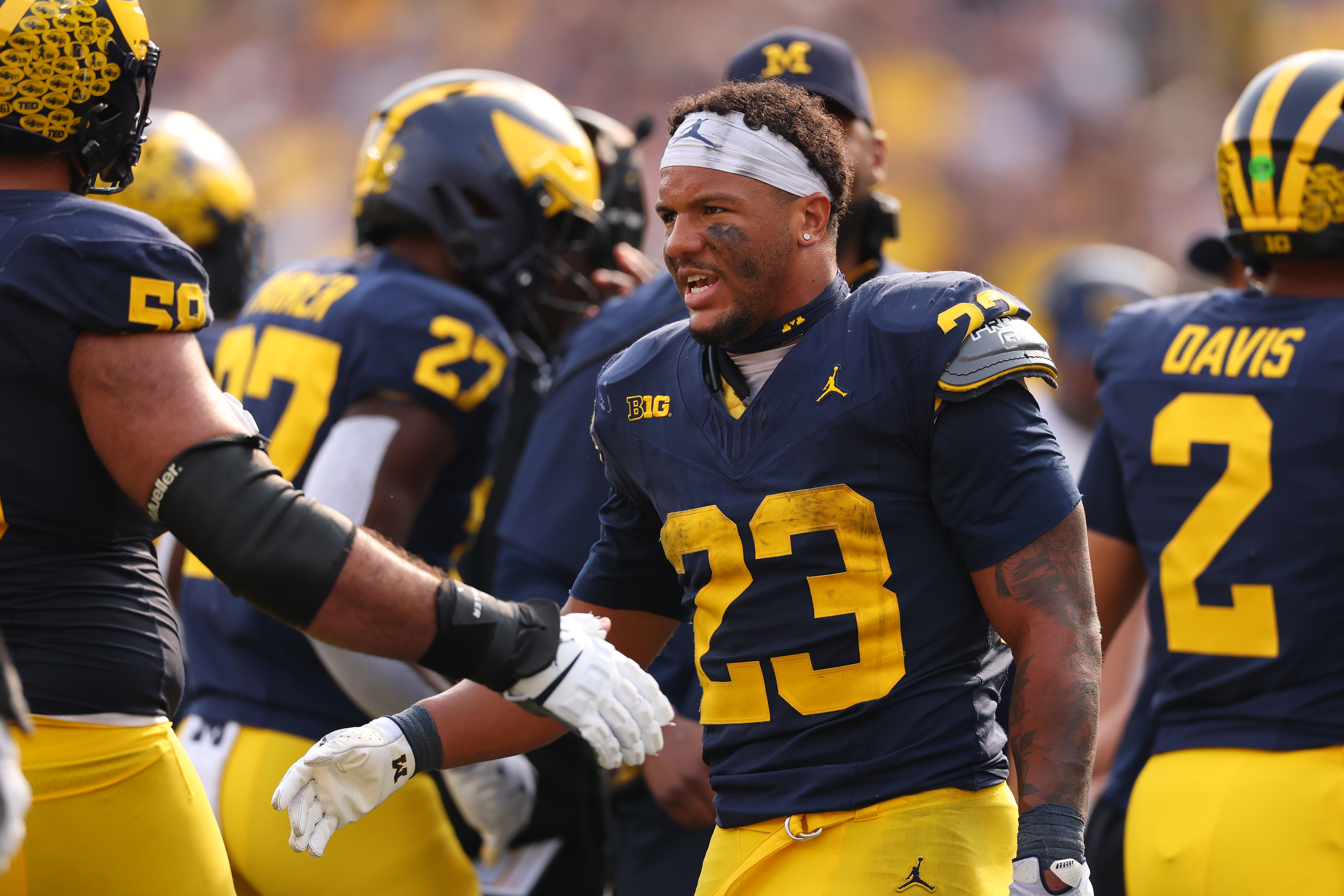 ANN ARBOR, MICHIGAN - OCTOBER 18: Jordan Marshall #23 of the Michigan Wolverines plays against the Washington Huskies at Michigan Stadium on October 18, 2025 in Ann Arbor, Michigan.  (Photo by Gregory Shamus/Getty Images)
