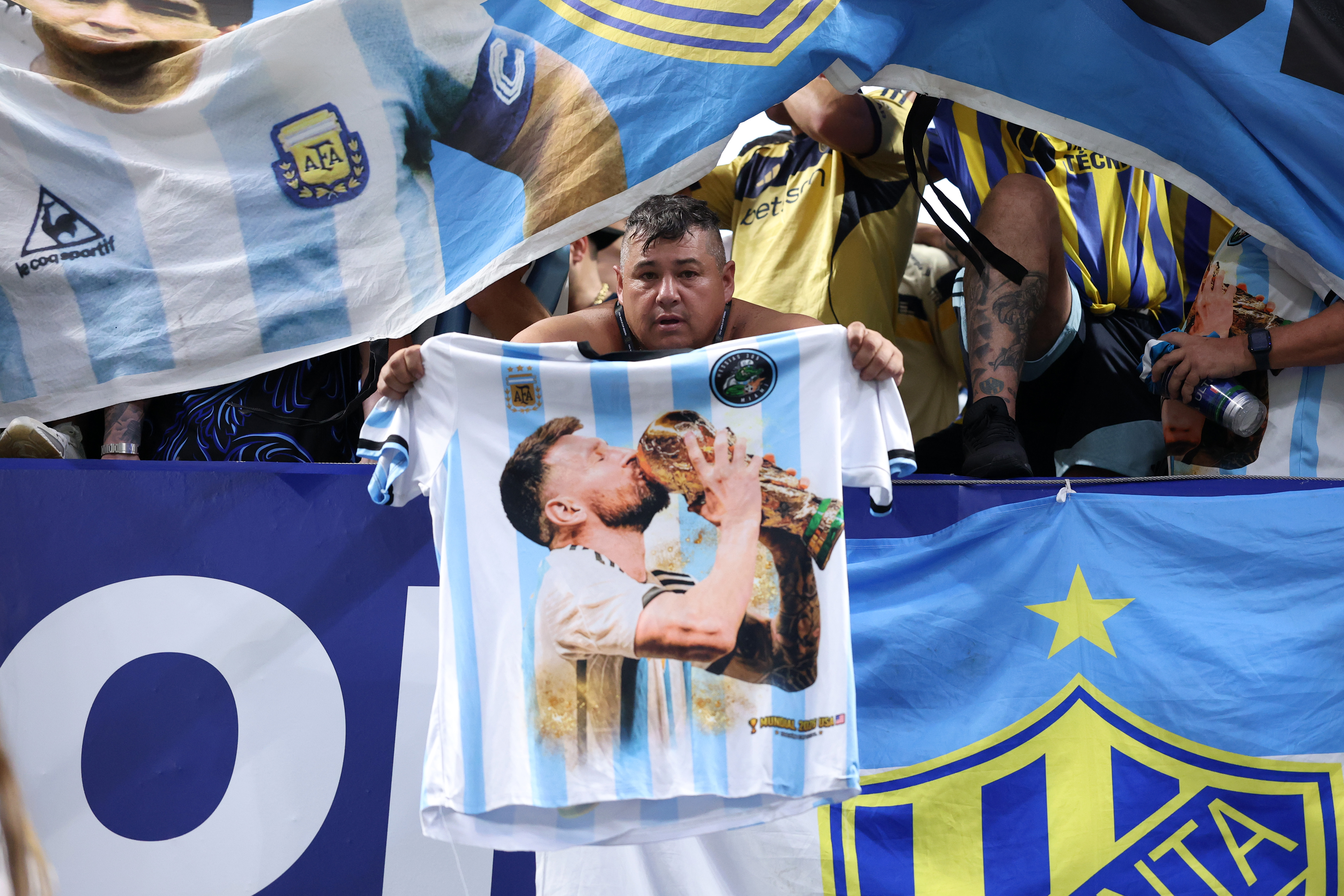 ATLANTA, GEORGIA - JULY 07: A fan hold a shirt of Lionel Messi #10 of Argentina  during the FIFA World Cup 2026 Round of 16 match between Argentina and Egypt at Atlanta Stadium on July 07, 2026 in Atlanta, Georgia. (Photo by Justin Setterfield/Getty Images)