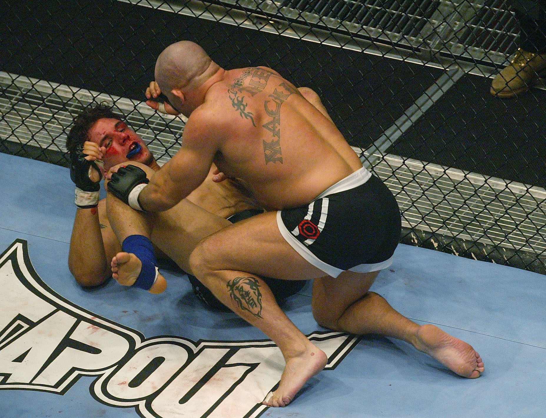 LONDON - JULY 13:  Ian Freeman of Great Britain fights with Frank Mir of the USA during the Ultimate Fighting Championship, "Brawl in the Royal Albert Hall", in the Royal Albert Hall London, England on July 13, 2002. (Photo by Mike Hewitt/Getty Images)