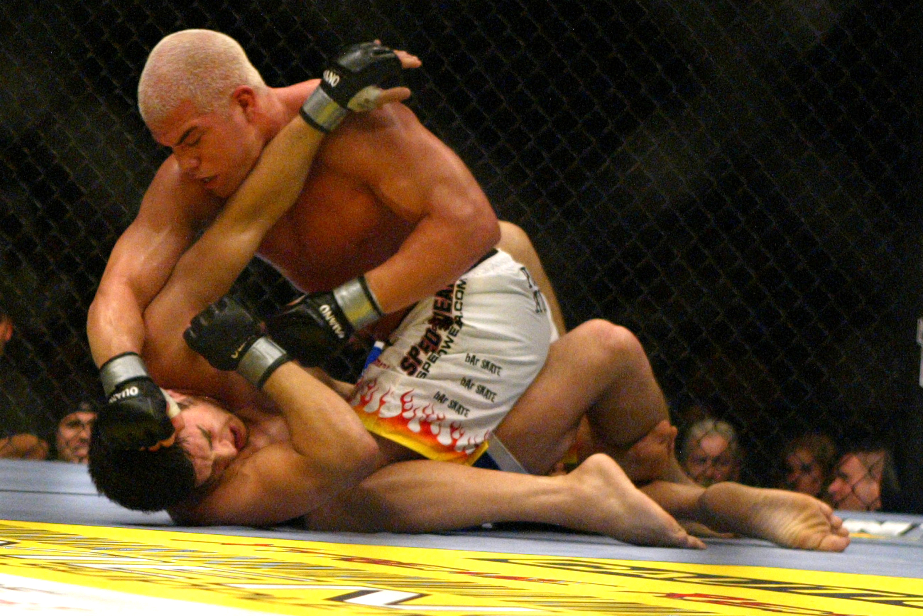 Tito Ortiz throws a right to the head of Patrick Cote during their 3 round Light Heavyweight bout at UFC 50 in Atlantic City, NJ.  Ortiz won via unanimous decision. (Photo by Ed Mulholland/WireImage)