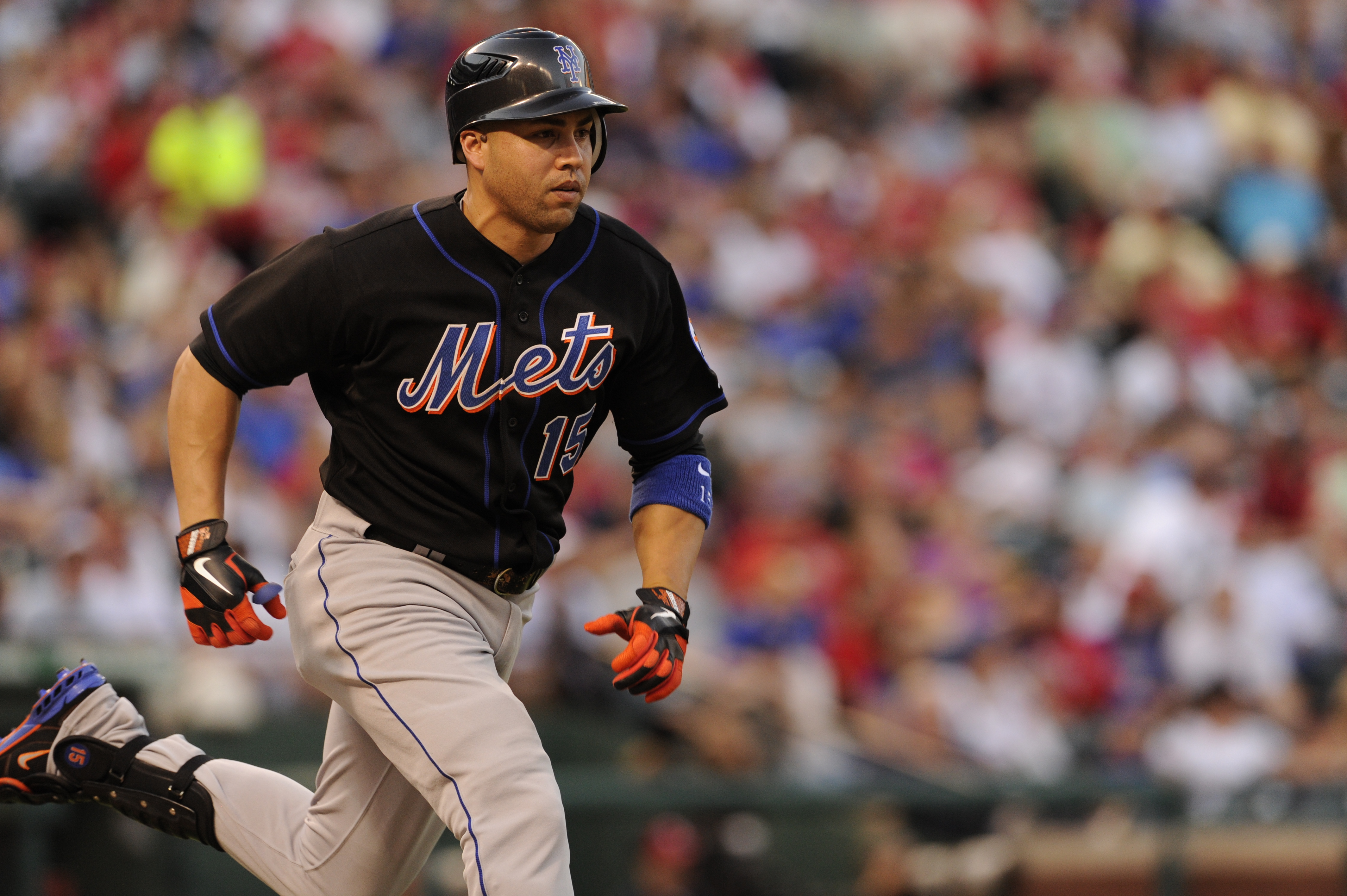 ARLINGTON, TX - JUNE 24:  Carlos Beltran #15 of the New York Mets runs to first base after hitting the ball in the game against the Texas Rangers at Rangers Ballpark on June 24, 2011 in Arlington, Texas.  The Texas Rangers defeated the New York Mets 8-1.  (Photo by John Williamson/MLB Photos via Getty Images)