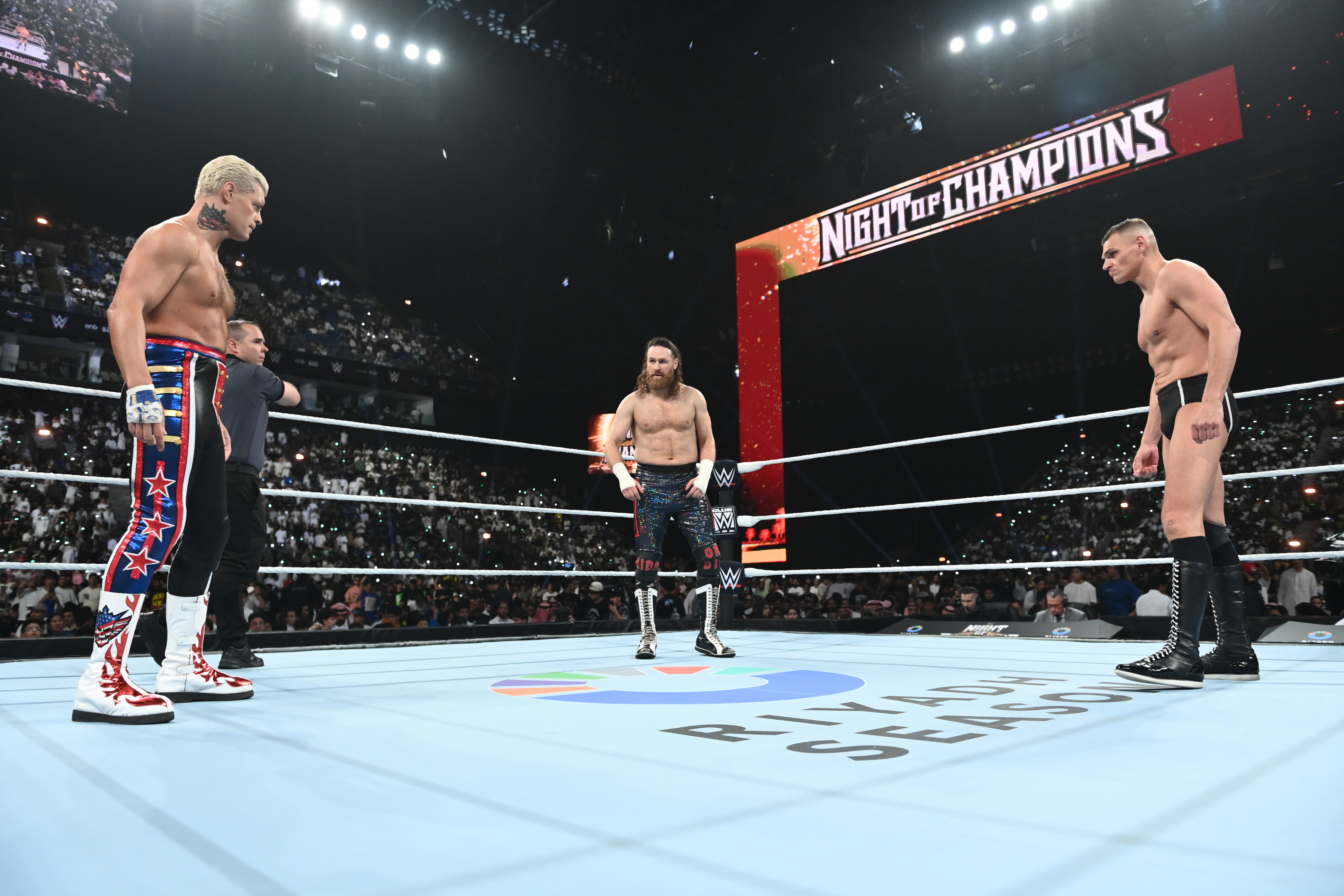RIYADH, SAUDI ARABIA - JUNE 27: Cody Rhodes, Sami Zayn and Gunther face off during Night of Champions at Kingdom Arena on June 27, 2026 in Riyadh, Saudi Arabia.  (Photo by Andrew Timms/WWE via Getty Images)