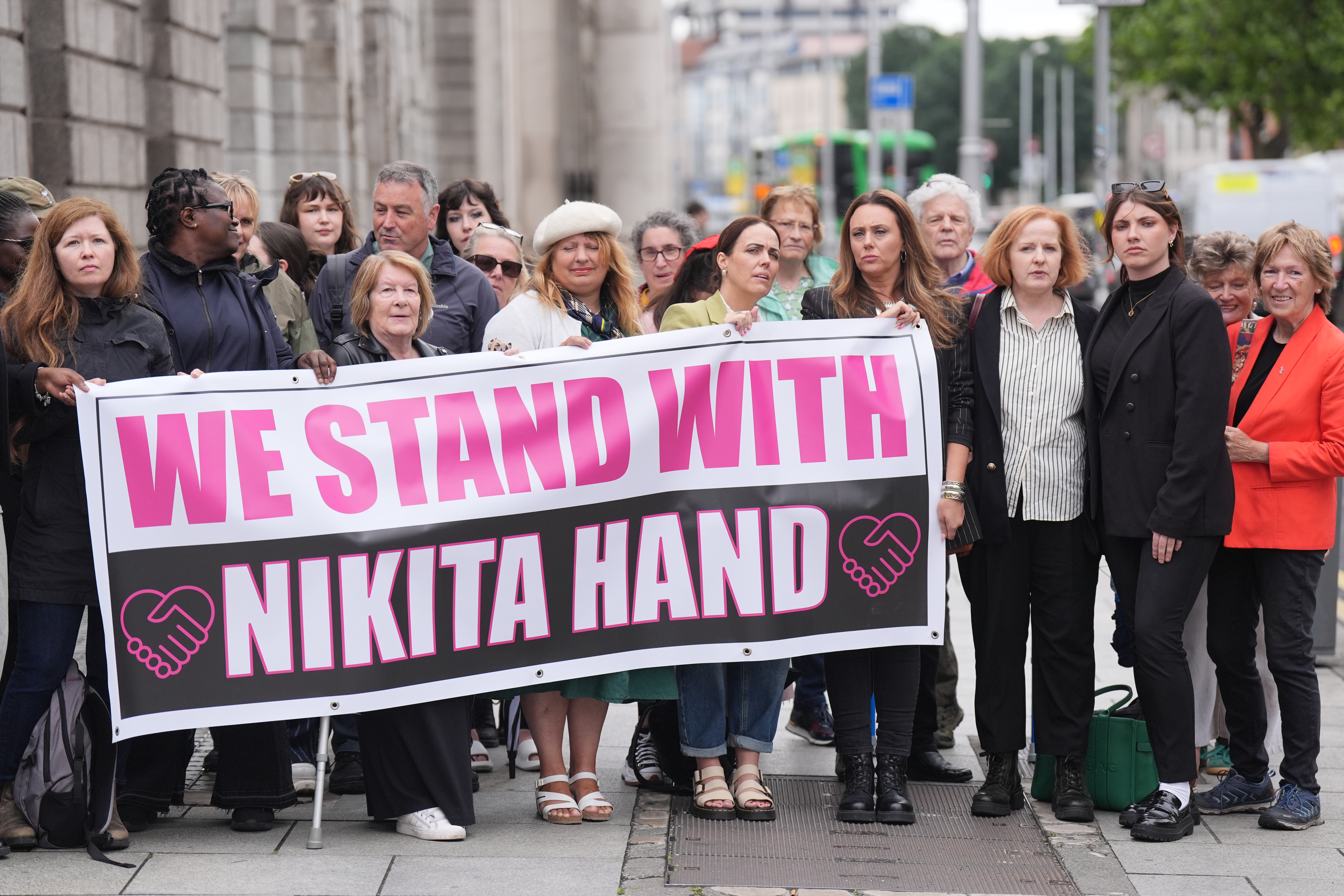 Supporters of Nikita Hand outside the Court of Appeal in Dublin where Conor McGregor is appealing against a decision in a civil case in which she accused him of raping her. Picture date: Tuesday July 1, 2025. (Photo by Niall Carson/PA Images via Getty Images)