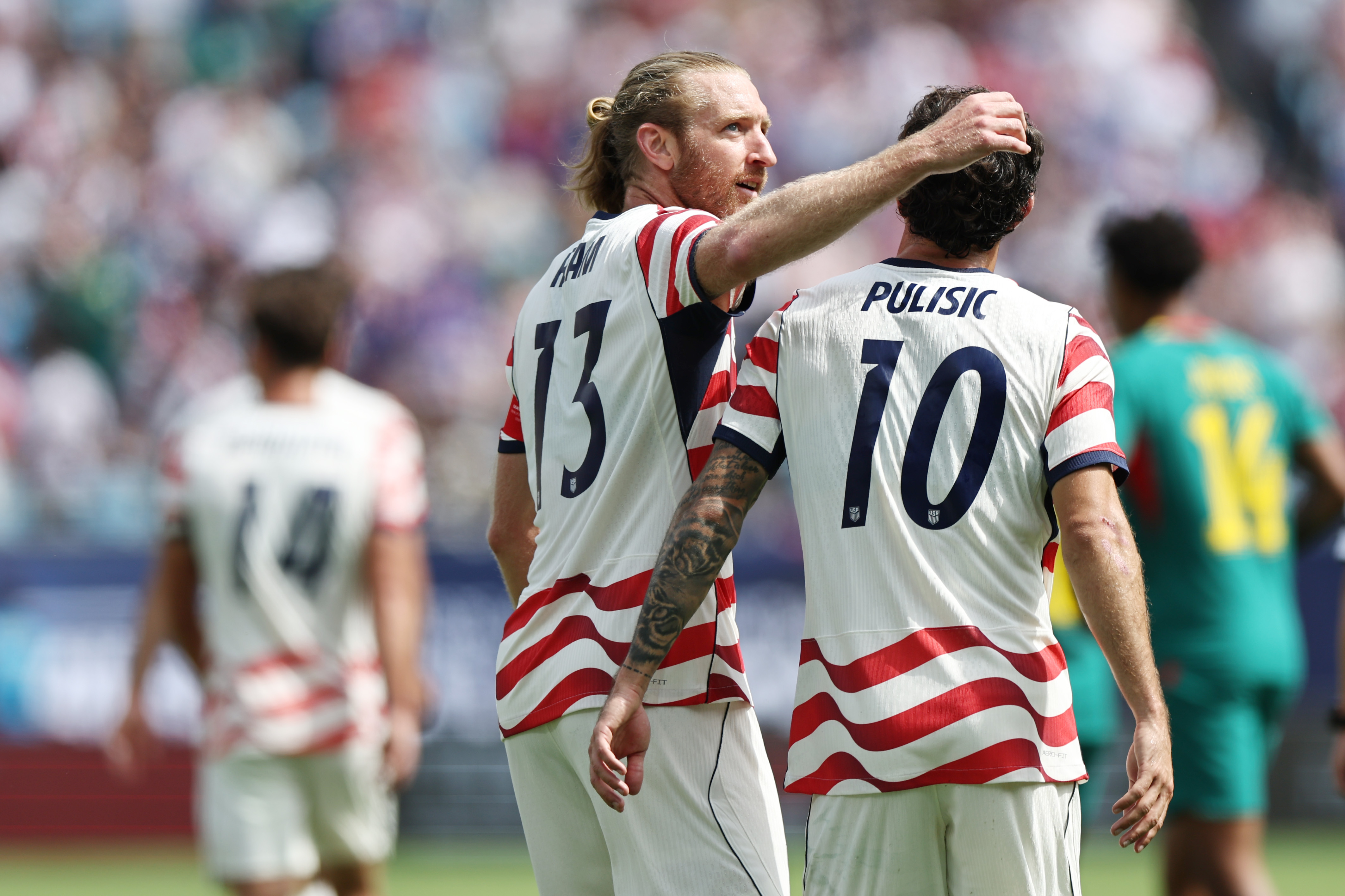 CHARLOTTE, NORTH CAROLINA - MAY 31: Christian Pulisic of United States celebrates with teammate Tim Ream after scoring his team's second goal during the international friendly match between United States and Senegal at Bank of America Stadium on May 31, 2026 in Charlotte, North Carolina. (Photo by Omar Vega/USSF/Getty Images)