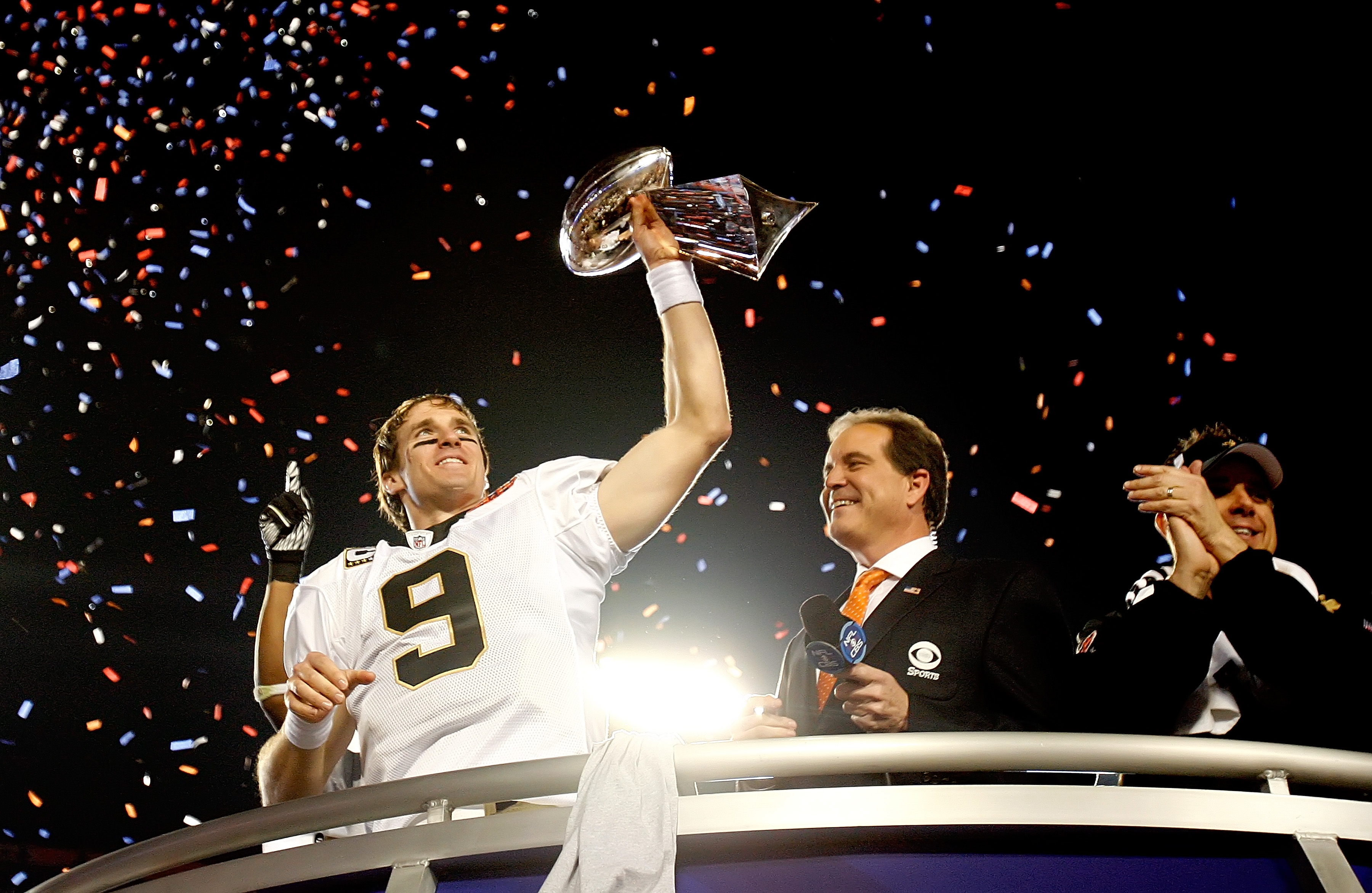 New Orleans Saints quarterback Drew Brees celebrates with the Vince Lombardi Trophy after the Saints beat the Indianapolis Colts in Super Bowl XLIV. (Photo by Gary Green/Orlando Sentinel/Tribune News Service via Getty Images)