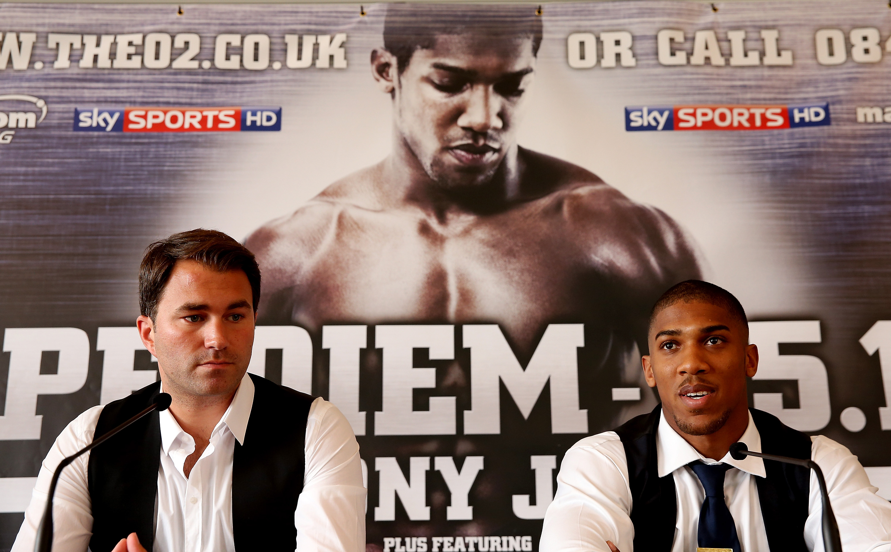 LONDON, ENGLAND - JULY 25:  Anthony Joshua and Eddie Hearn attend a press conference to announce his signing to Matchroom on July 25, 2013 in London, England.  (Photo by Scott Heavey/Getty Images)